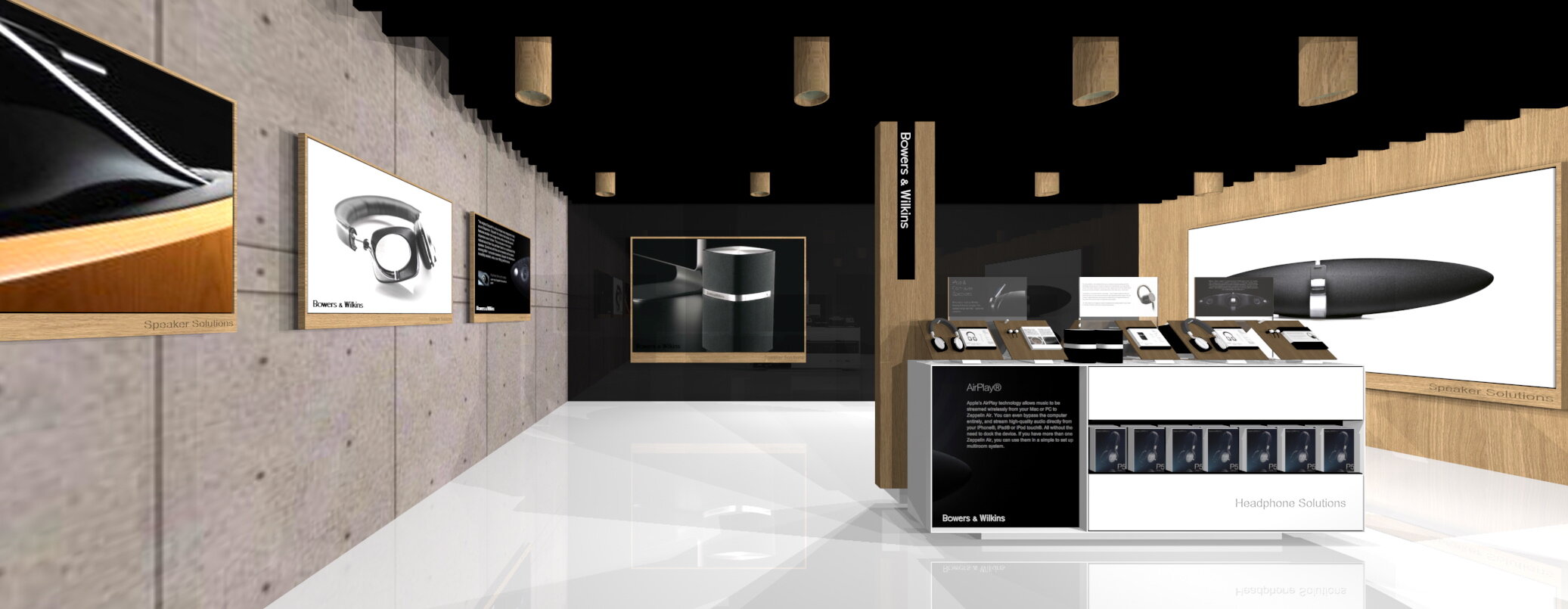 Display of headphones, speakers, and audio equipment at an electronics store section labeled Bowers & Wilkins.