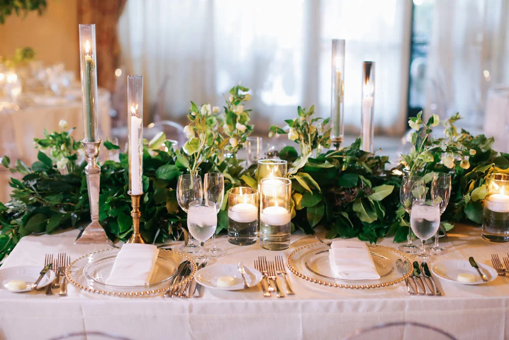 aboutdetailsdetails.com | Brandon Kidd | LA Wedding Planner | Catalina Point Wedding | Wedding Reception Inspiration | Lush Greenery | Candlelight | Tall Candles