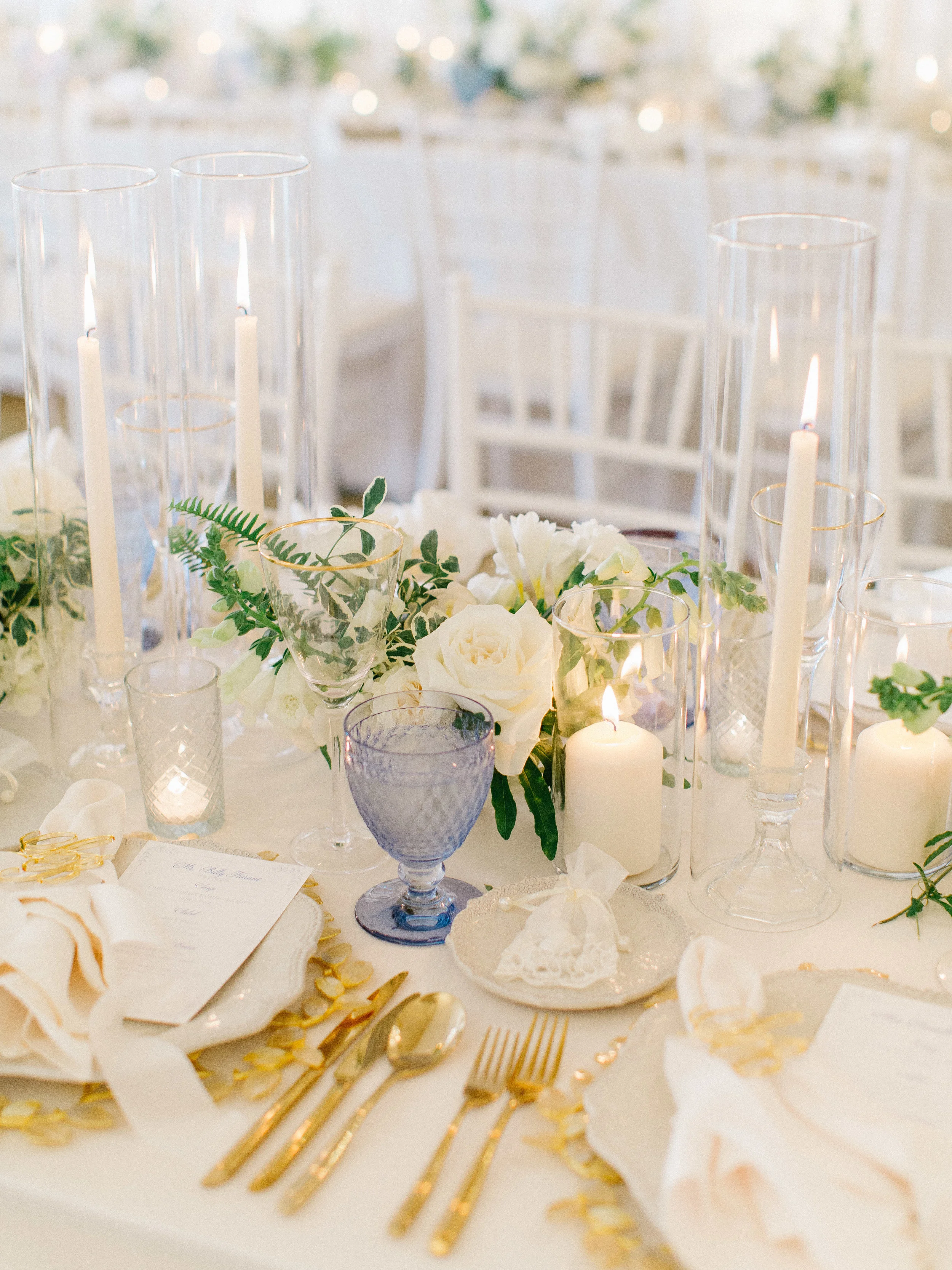 | Aboutdetailsdetails | Reception | White Wedding | Indigo Crystal | Crisp White | White Roses | Gold Accents | Table Setting