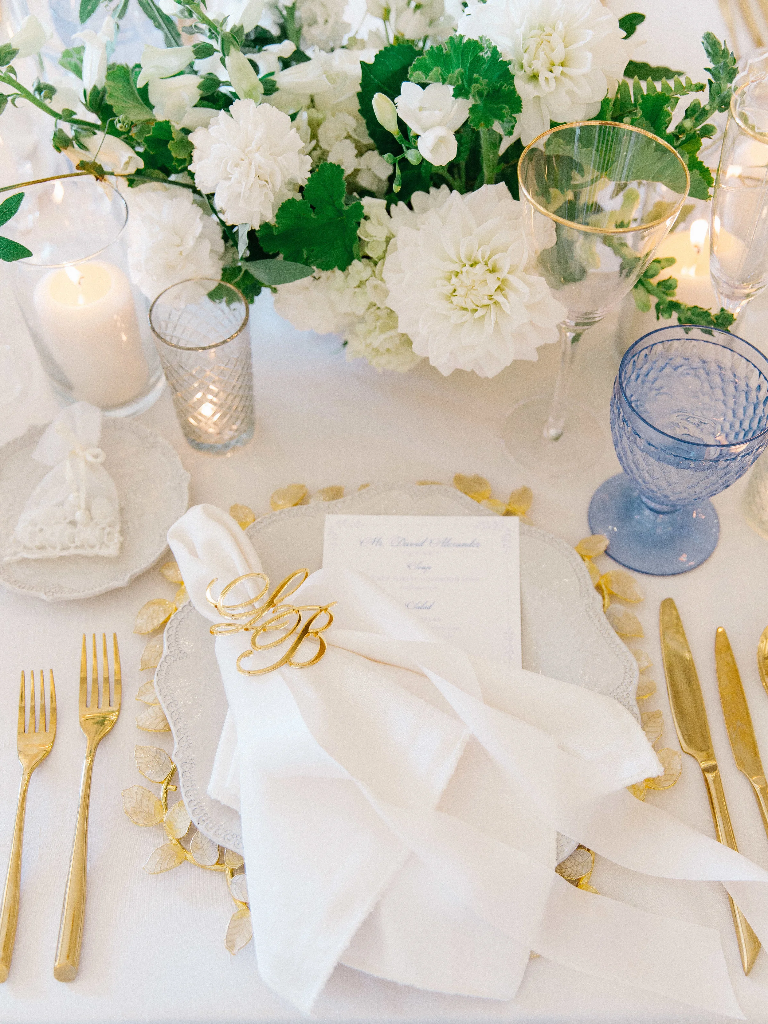 | Aboutdetailsdetails | Reception | White Wedding | Indigo Crystal | Crisp White | White Roses | Gold Accents | Table Setting