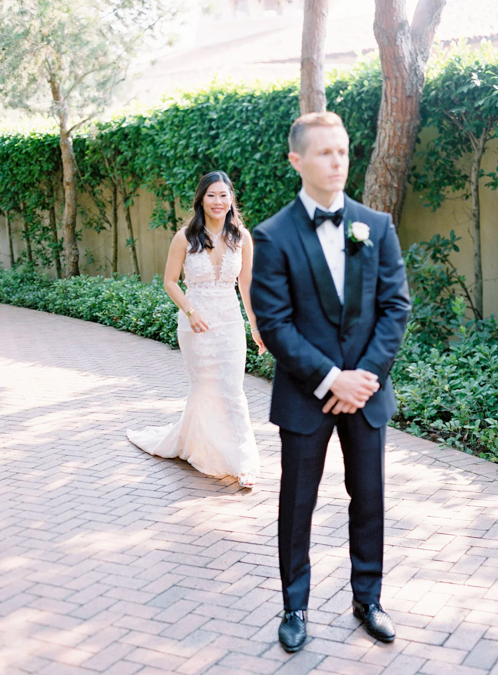 aboutdetailsdetails | bow tie | suit | groom | vows | OCweddingplanner | bride | first look | floral lace wedding dress |