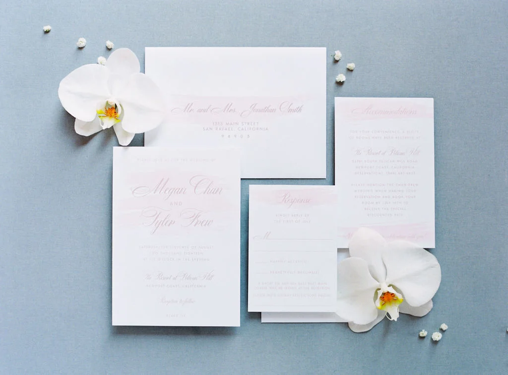 aboutdetailsdetails | invitational suits | orchids | plain white invitations | OCweddingplanner |