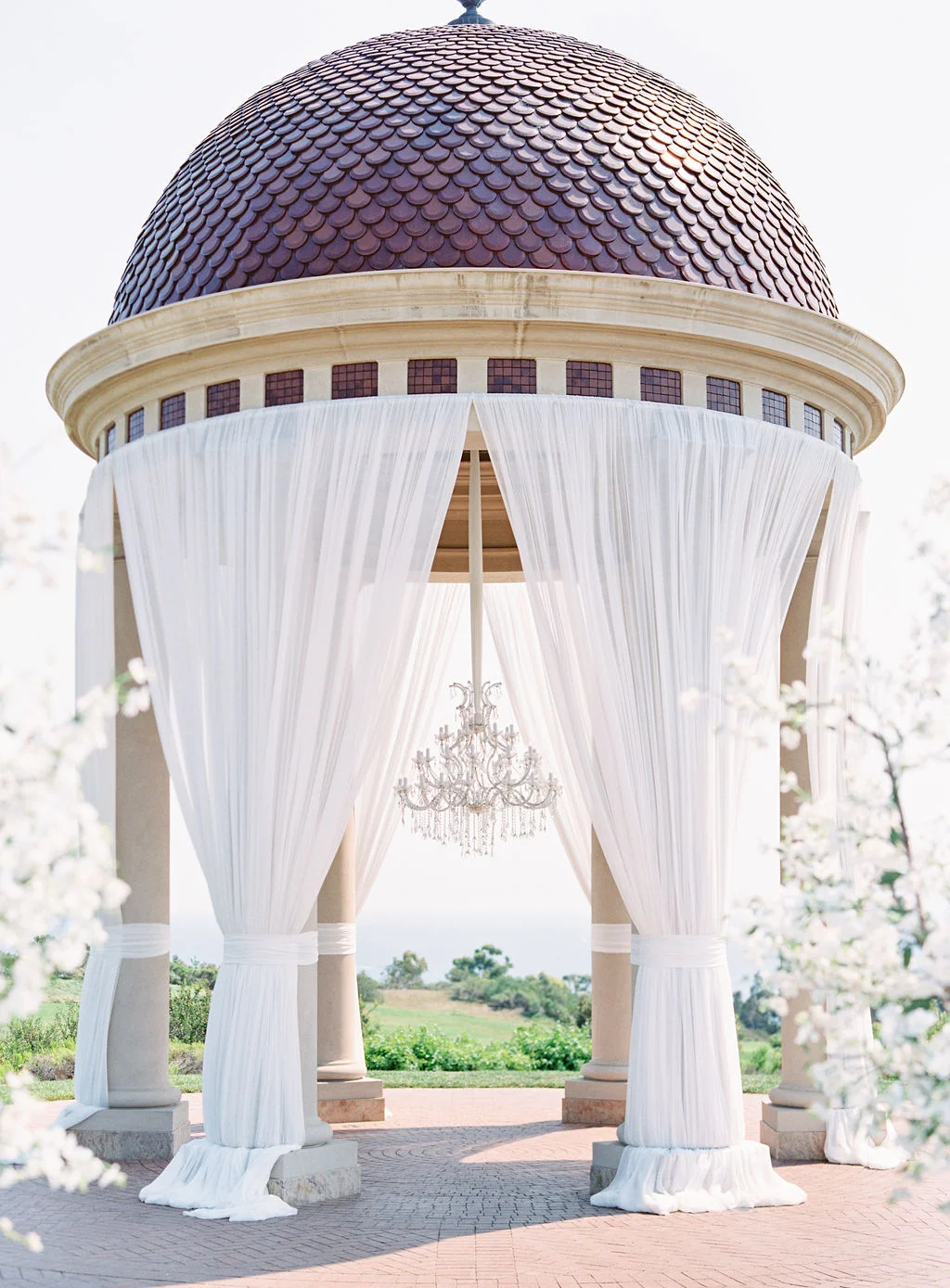 aboutdetailsdetails | OCweddingplanner | pelican hill | cherry blossoms | rose petal aisle way | outdoor ceremony |