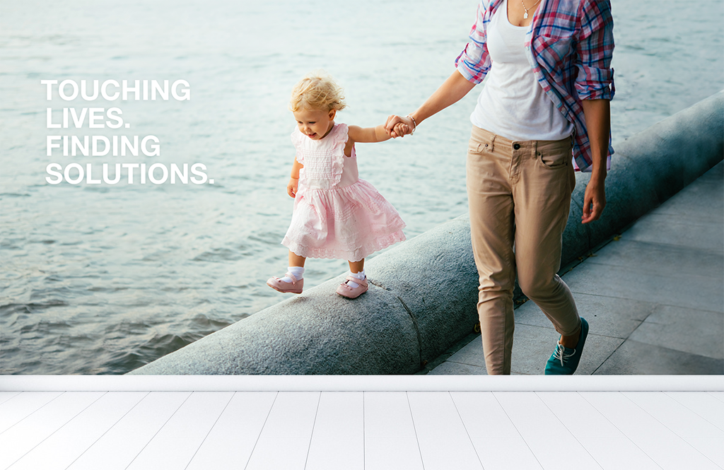 touching-lives-finding-solutions.png