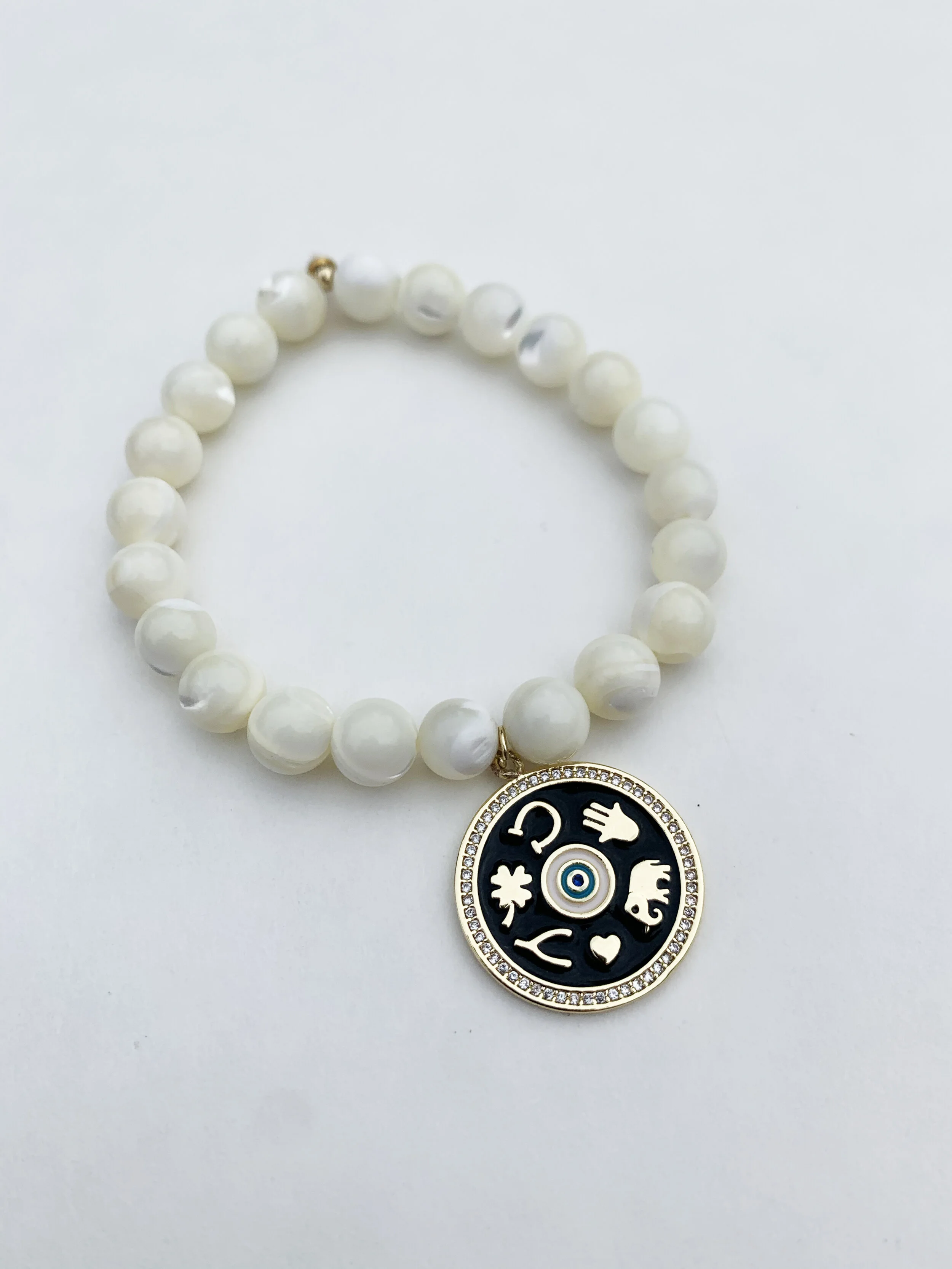 PURE_white_medallion.jpg