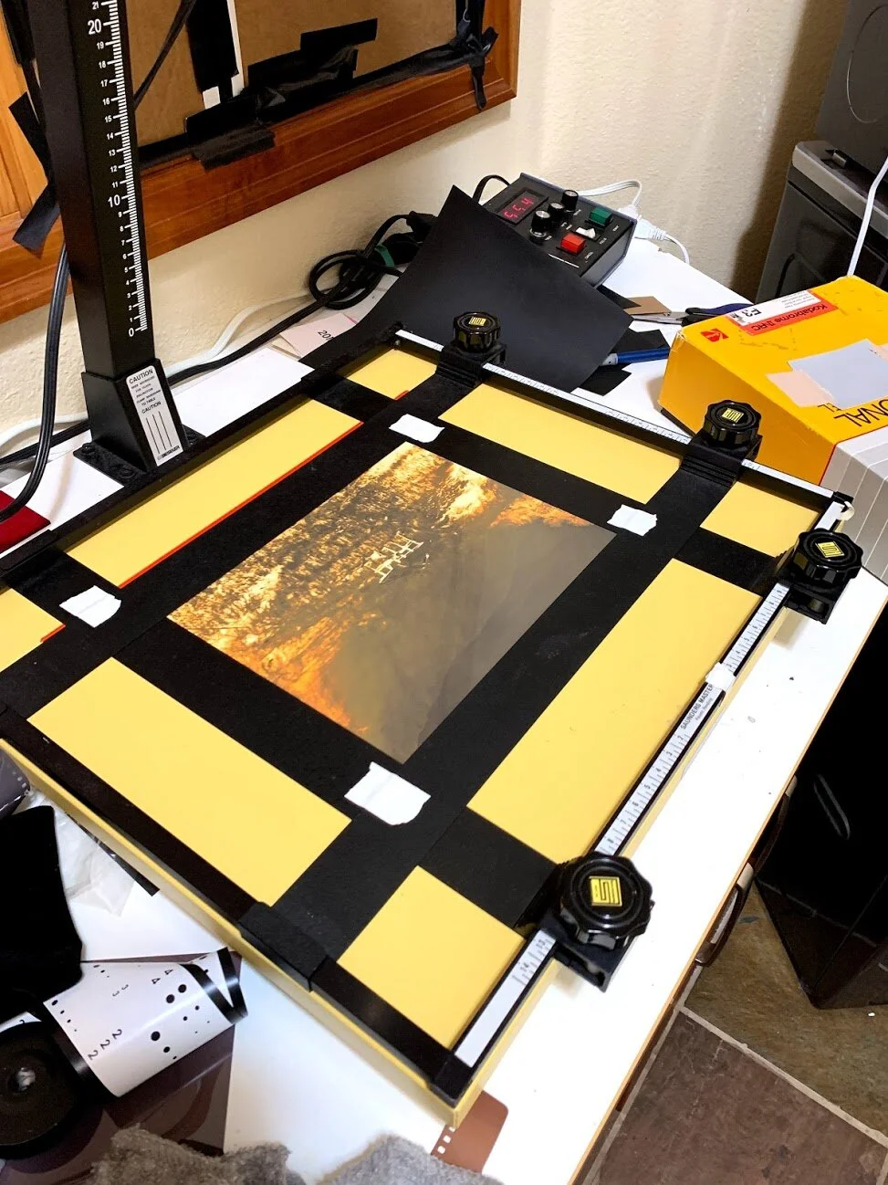 Kodabrome paper (later lith developed) being exposed with a lith printed Arista Ortho Litho internegative made from slide film