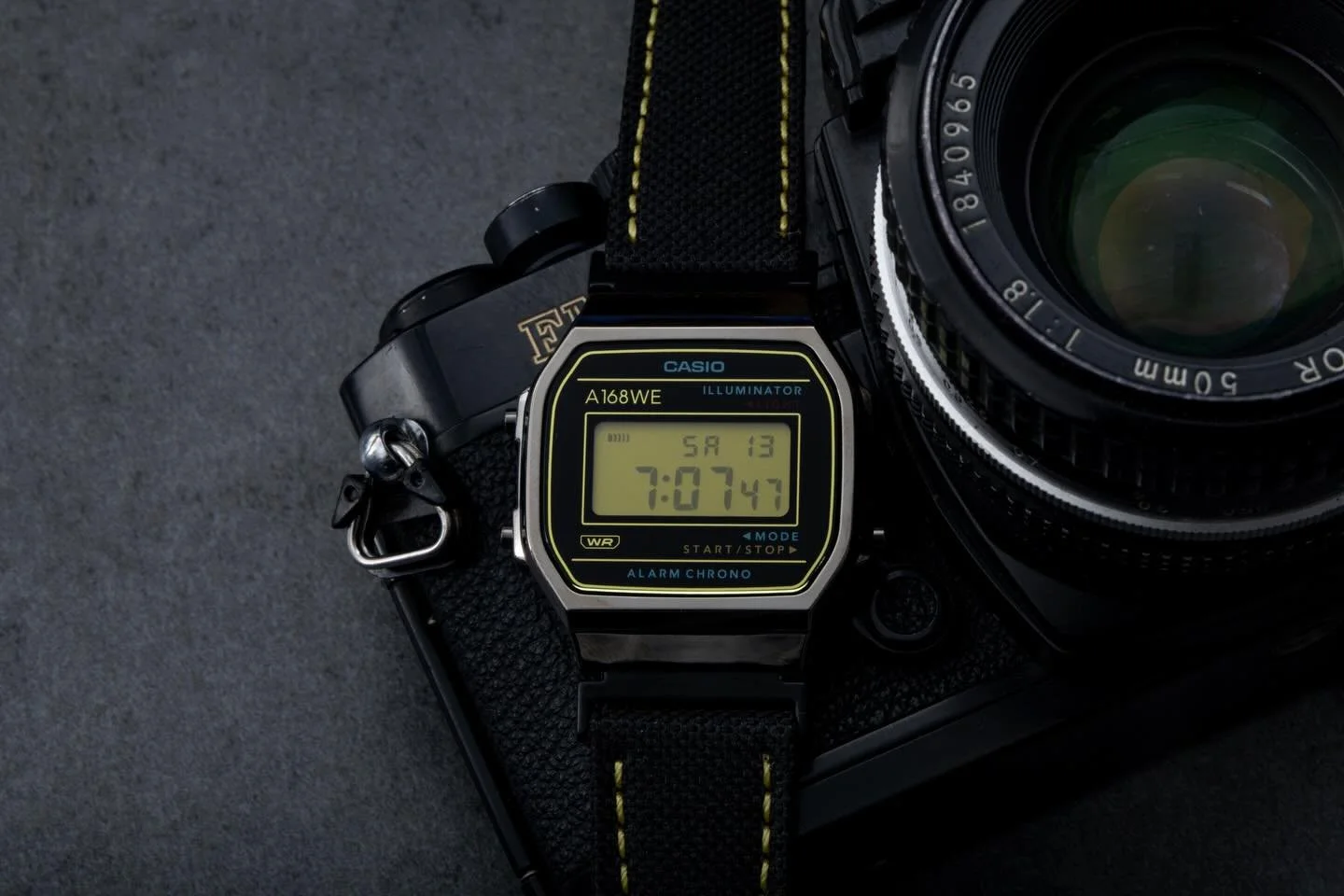 🔥 Introducing our latest custom timepiece: 🟡 N168

Inspired by the iconic  Nikon cameras, the N168 blends precision design with classic photographic style.

The Watch Features

- A striking yellow display, echoing Nikons signature branding,

- Comp