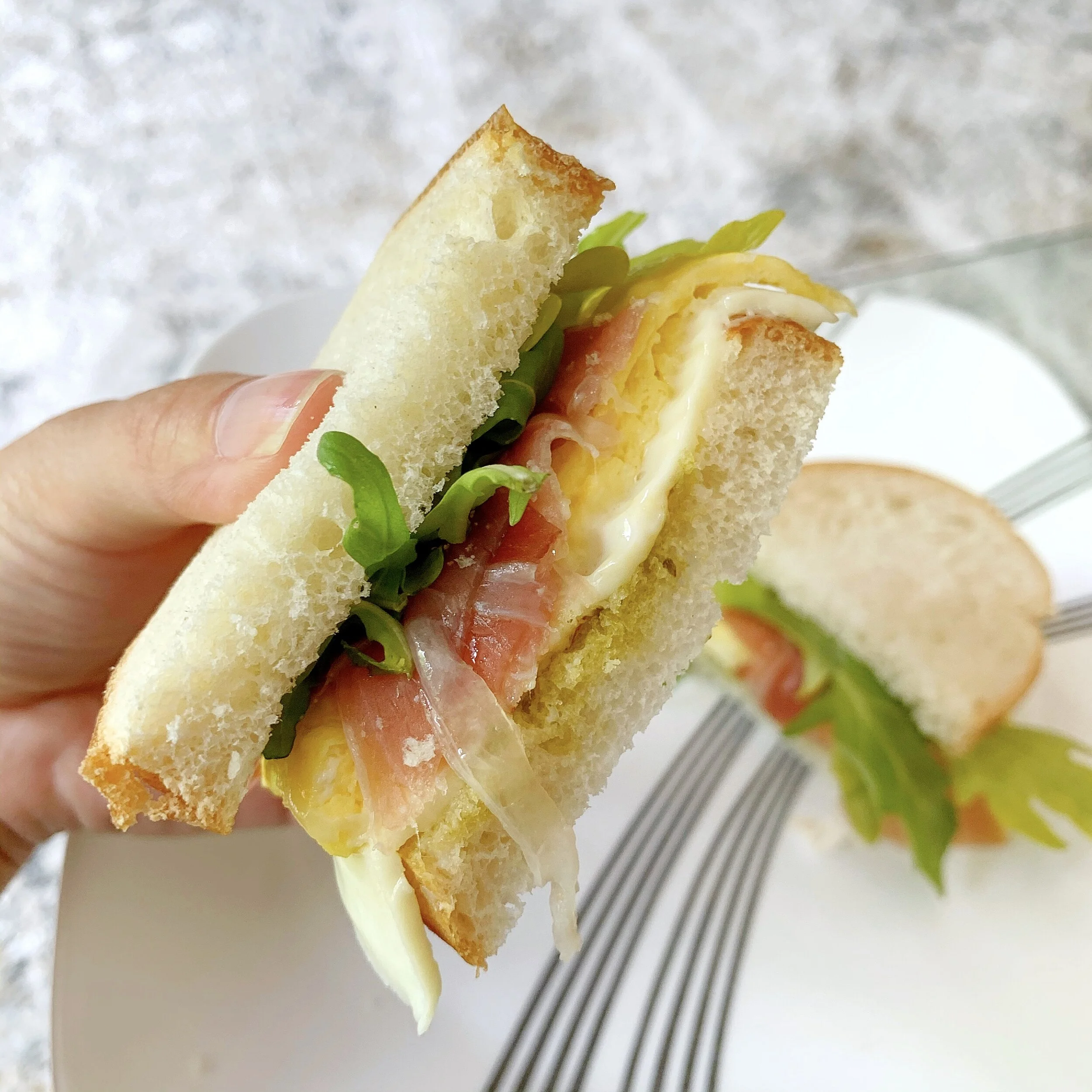 Scrambled Egg, Prosciutto, and Arugula Breakfast Sandwich