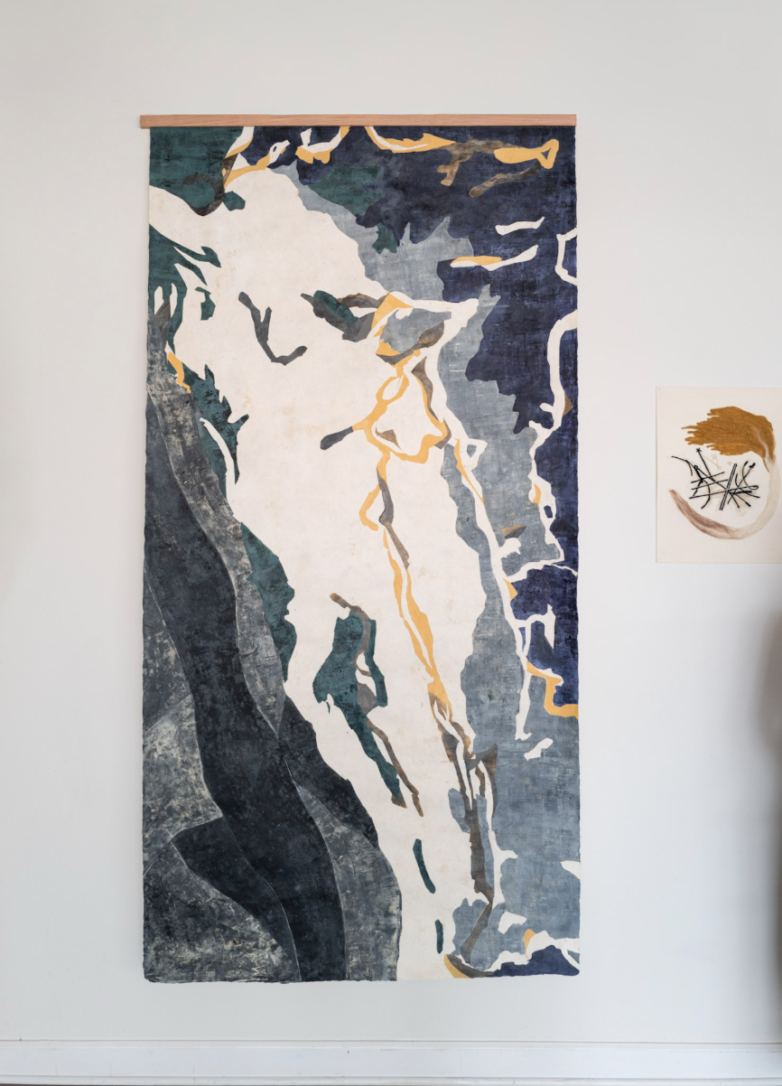Large vertical painting on amate paper with layered fields of dark blue, green, gray, white, and yellow suggesting mapped terrain and flowing water.
