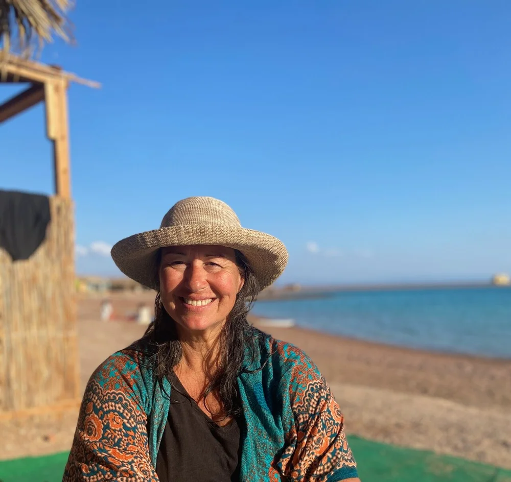 Josée modeling Kelly's hat