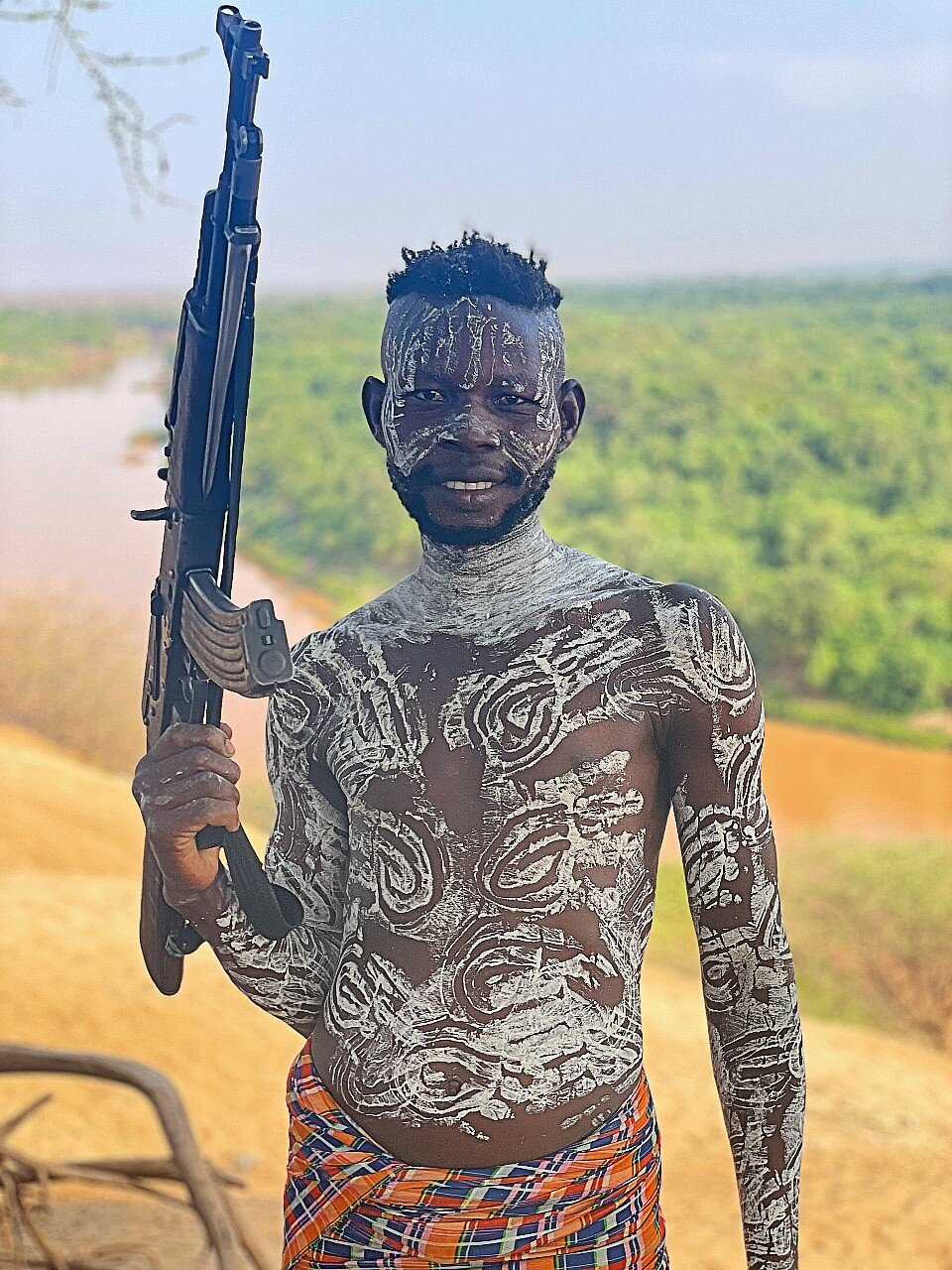 painted man gun.jpeg