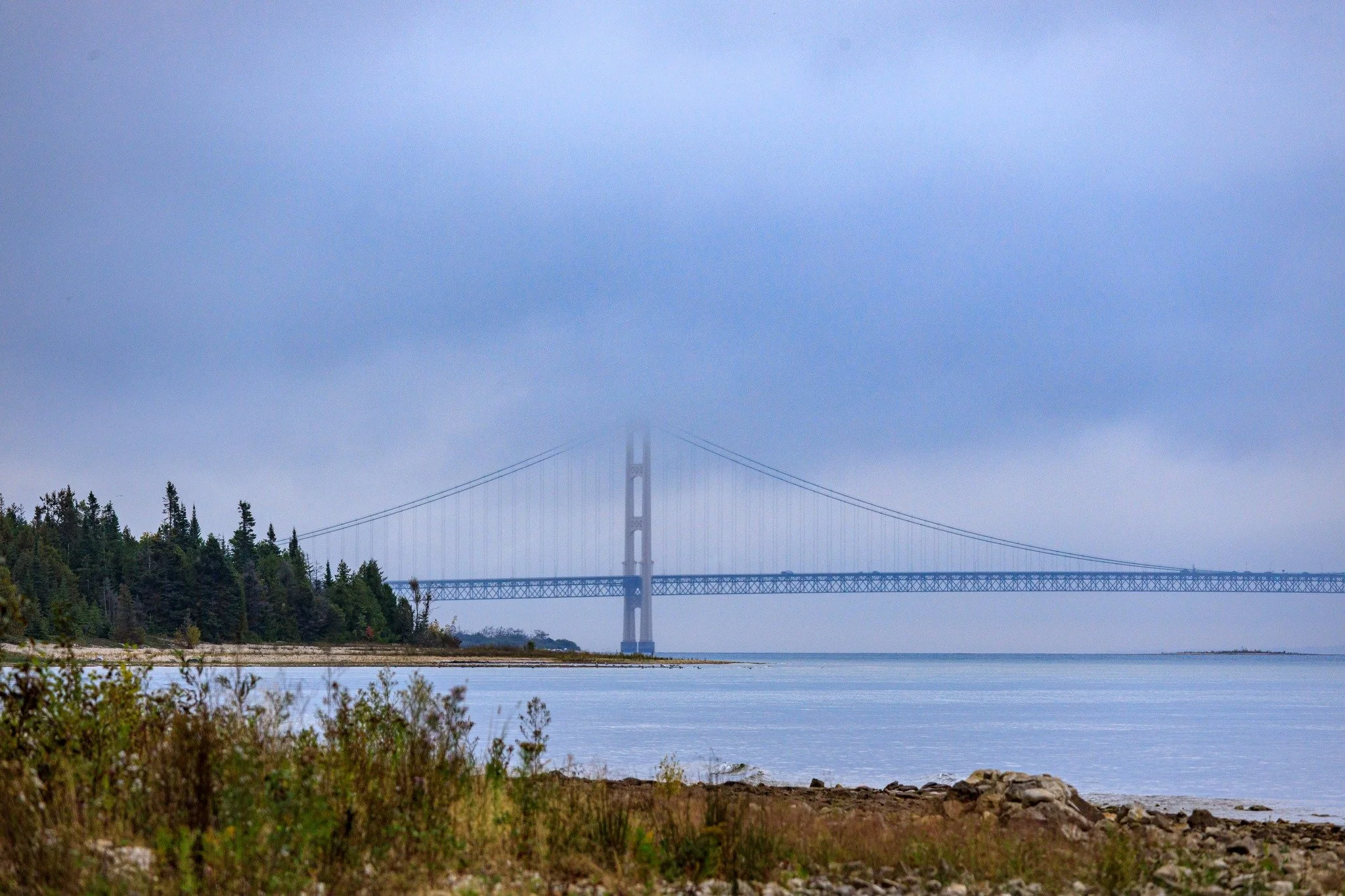 Foggy Mighty Mac from the Yooper Lake Michigan shore. 
#mackinacbridge #foggyphotography #LakeMichiganViews