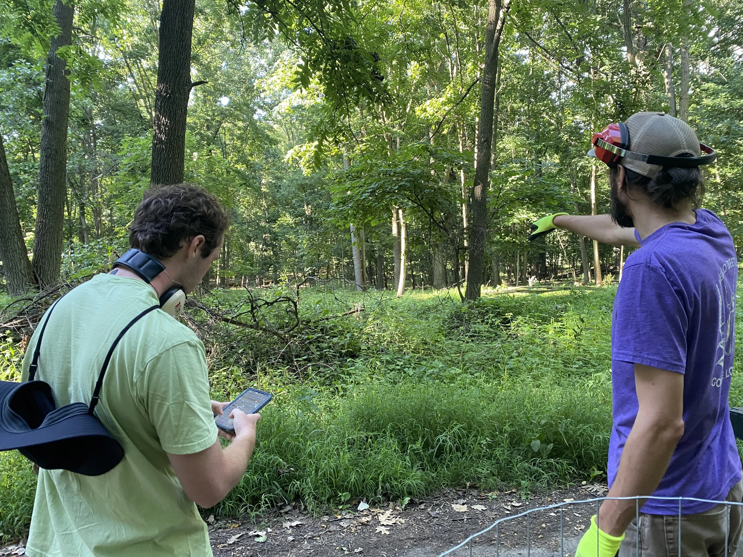  (left to right) Jimmy Lane (board member) and Josh Kieser (board member) looking at map for location of saplings. 