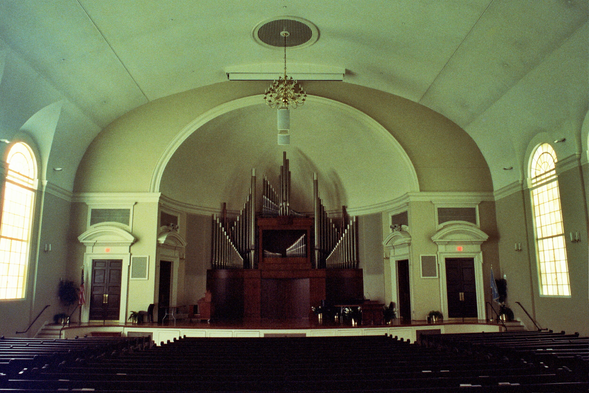 Sisters Chapel in Atlanta, Georgia. Focus is on the large organ at the center of the chapel's stage.