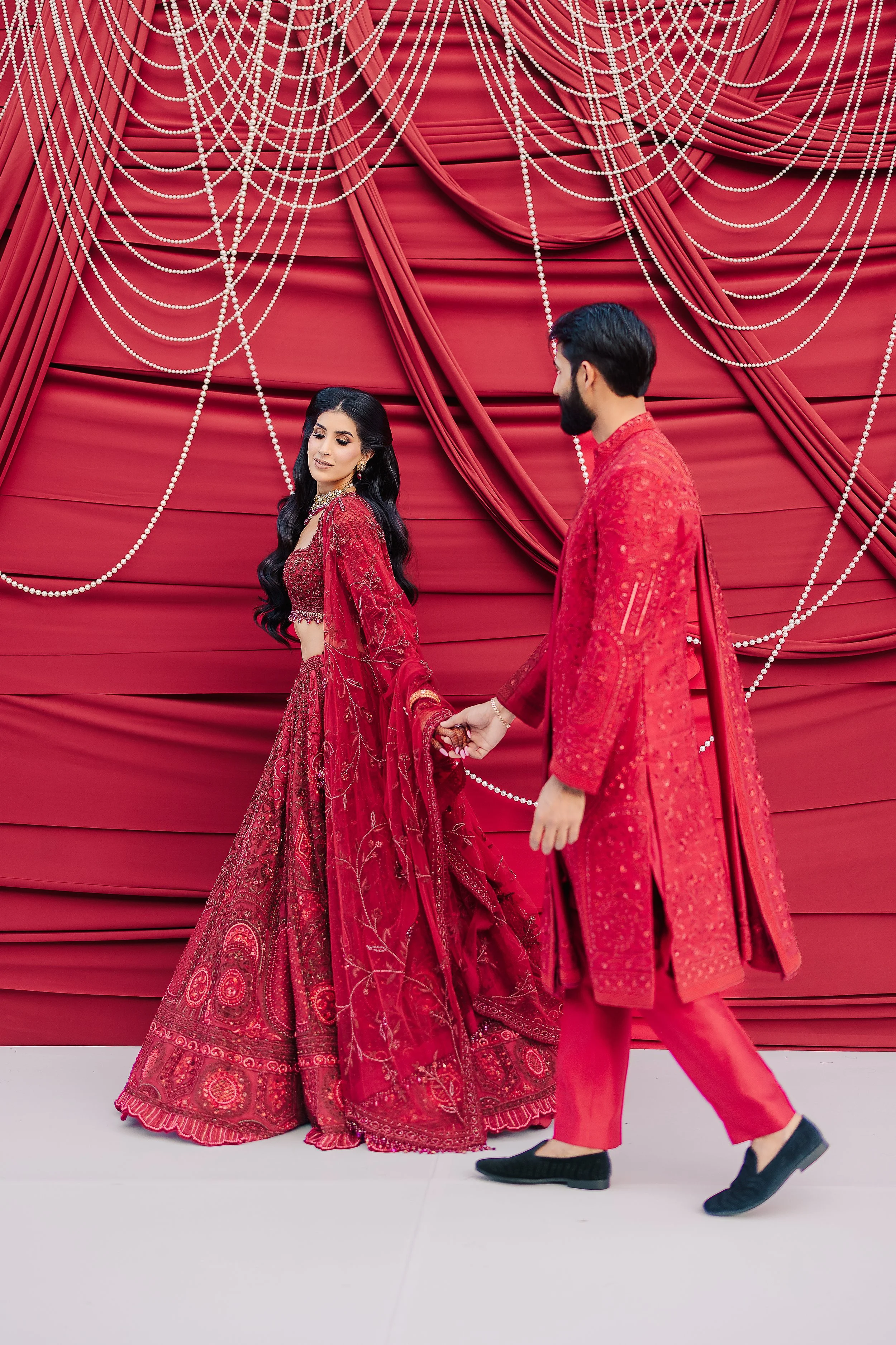 Jessica Gill and Raymond Grewal celebrating their intimate wedding at a private residence in Sherwood Park, Alberta.