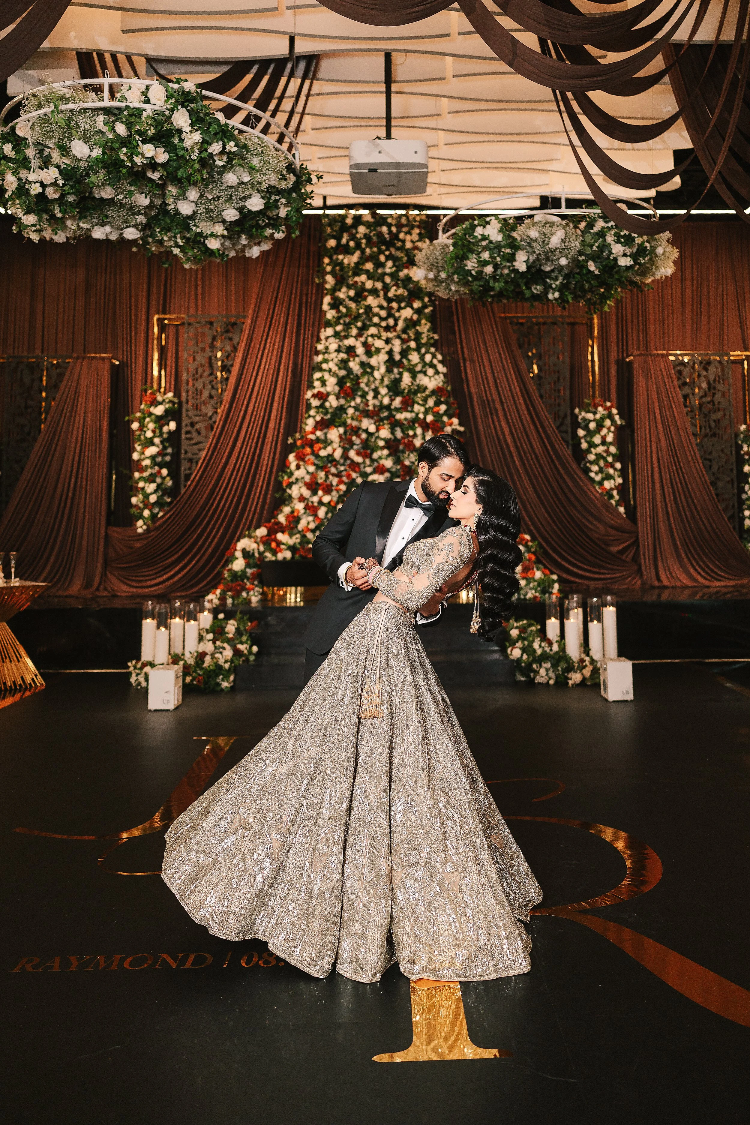 Jessica Gill and Raymond Grewal celebrating their intimate wedding at a private residence in Sherwood Park, Alberta.