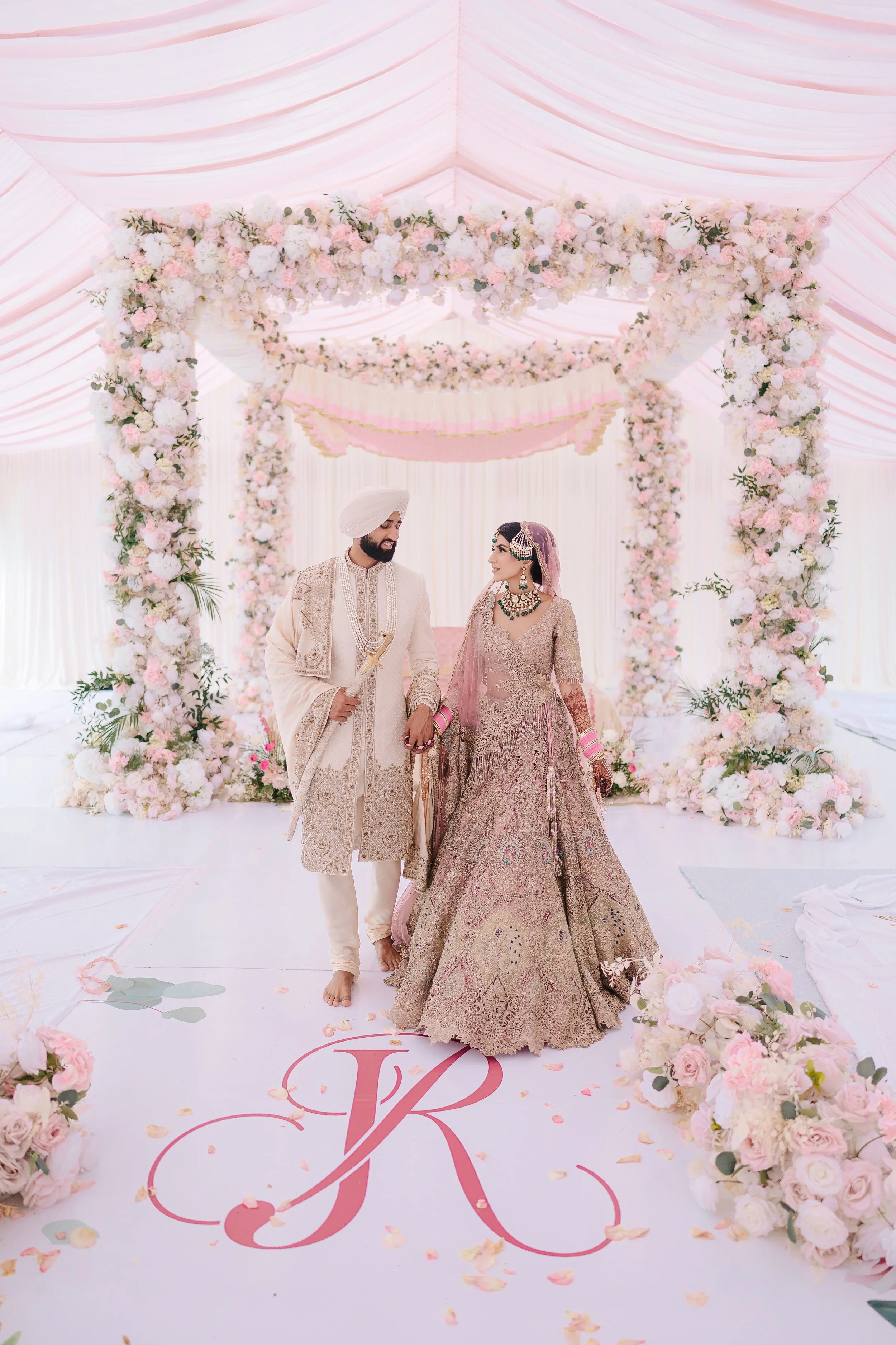 Jessica Gill and Raymond Grewal celebrating their intimate wedding at a private residence in Sherwood Park, Alberta.