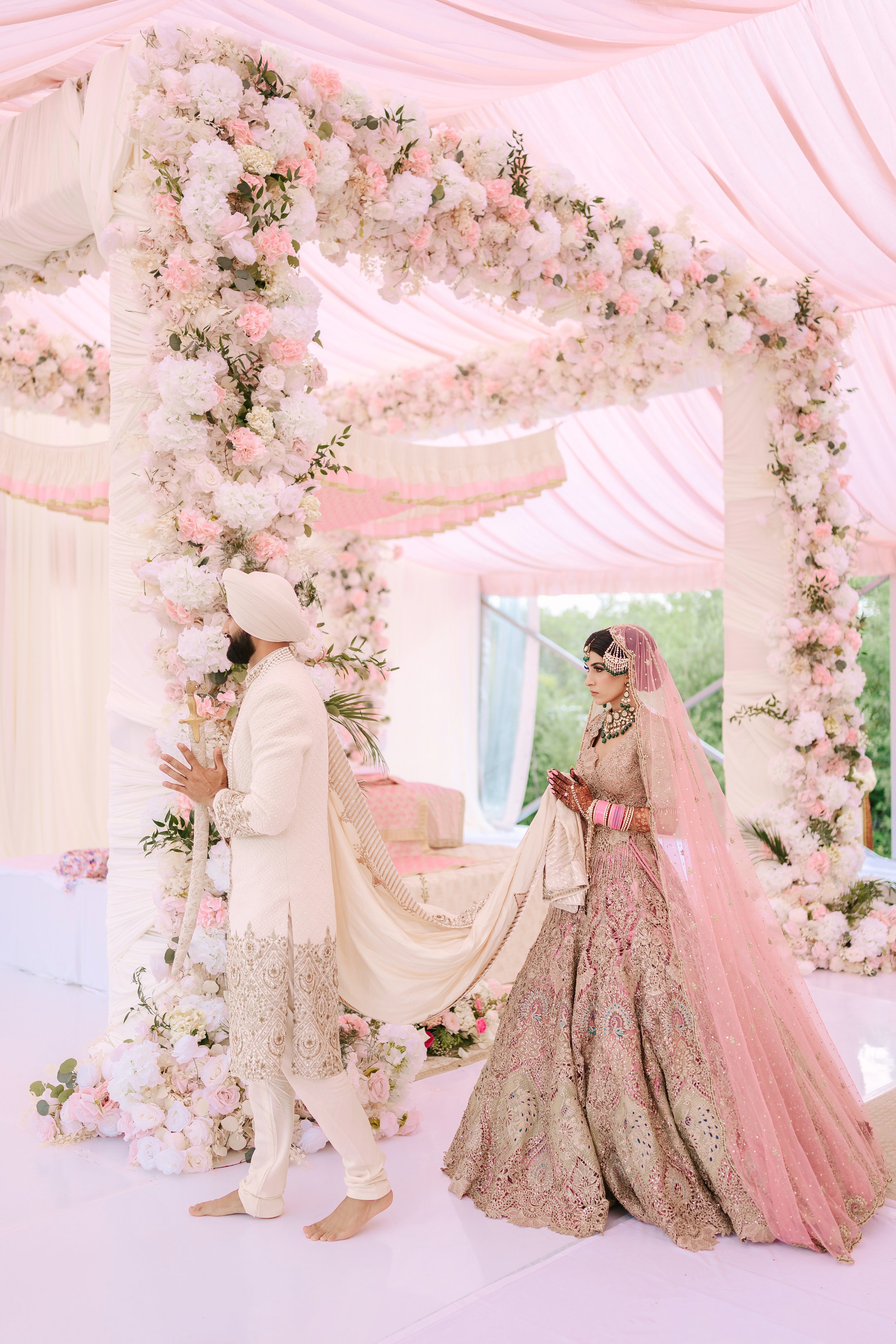 Jessica Gill and Raymond Grewal celebrating their intimate wedding at a private residence in Sherwood Park, Alberta.