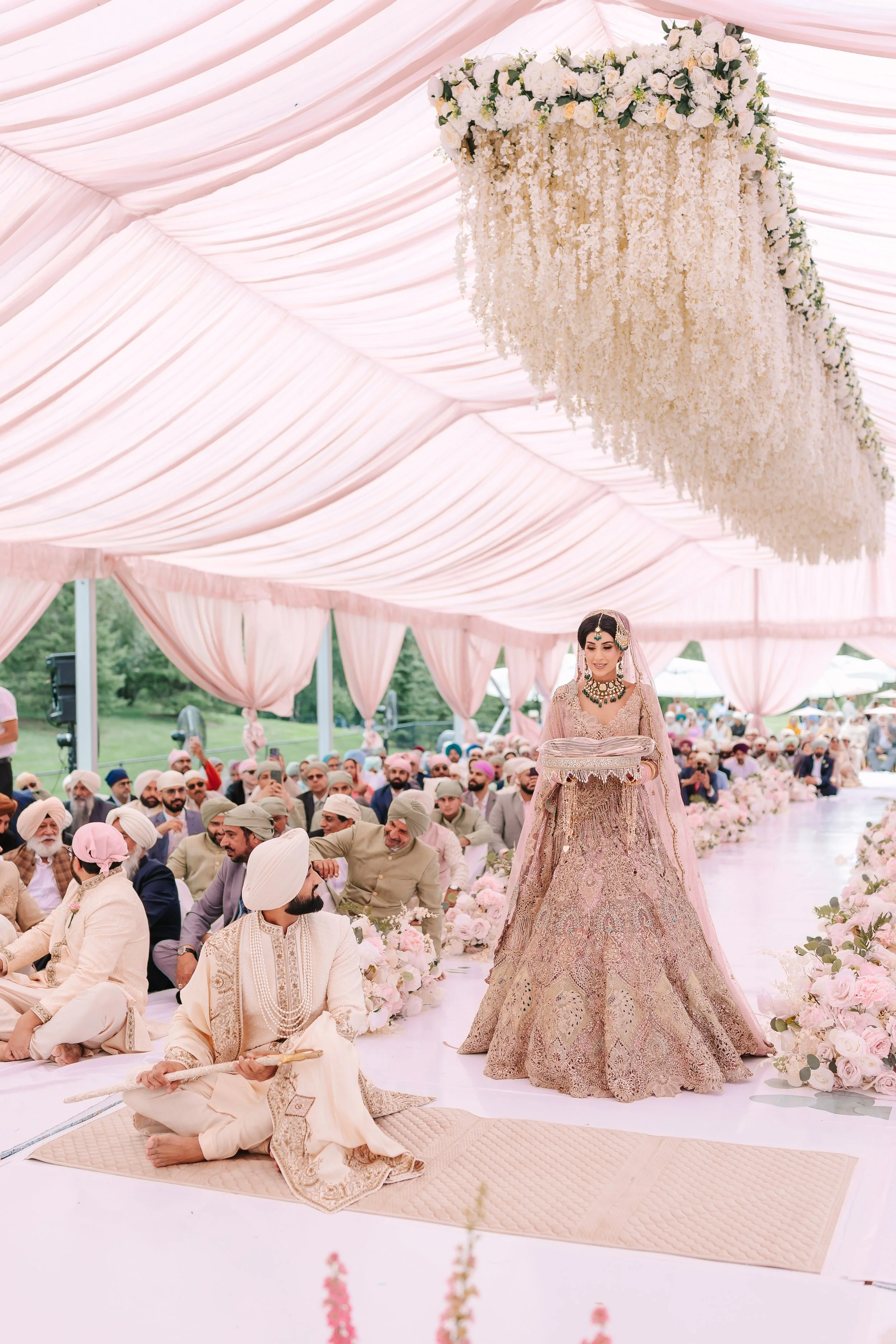 Jessica Gill and Raymond Grewal celebrating their intimate wedding at a private residence in Sherwood Park, Alberta.