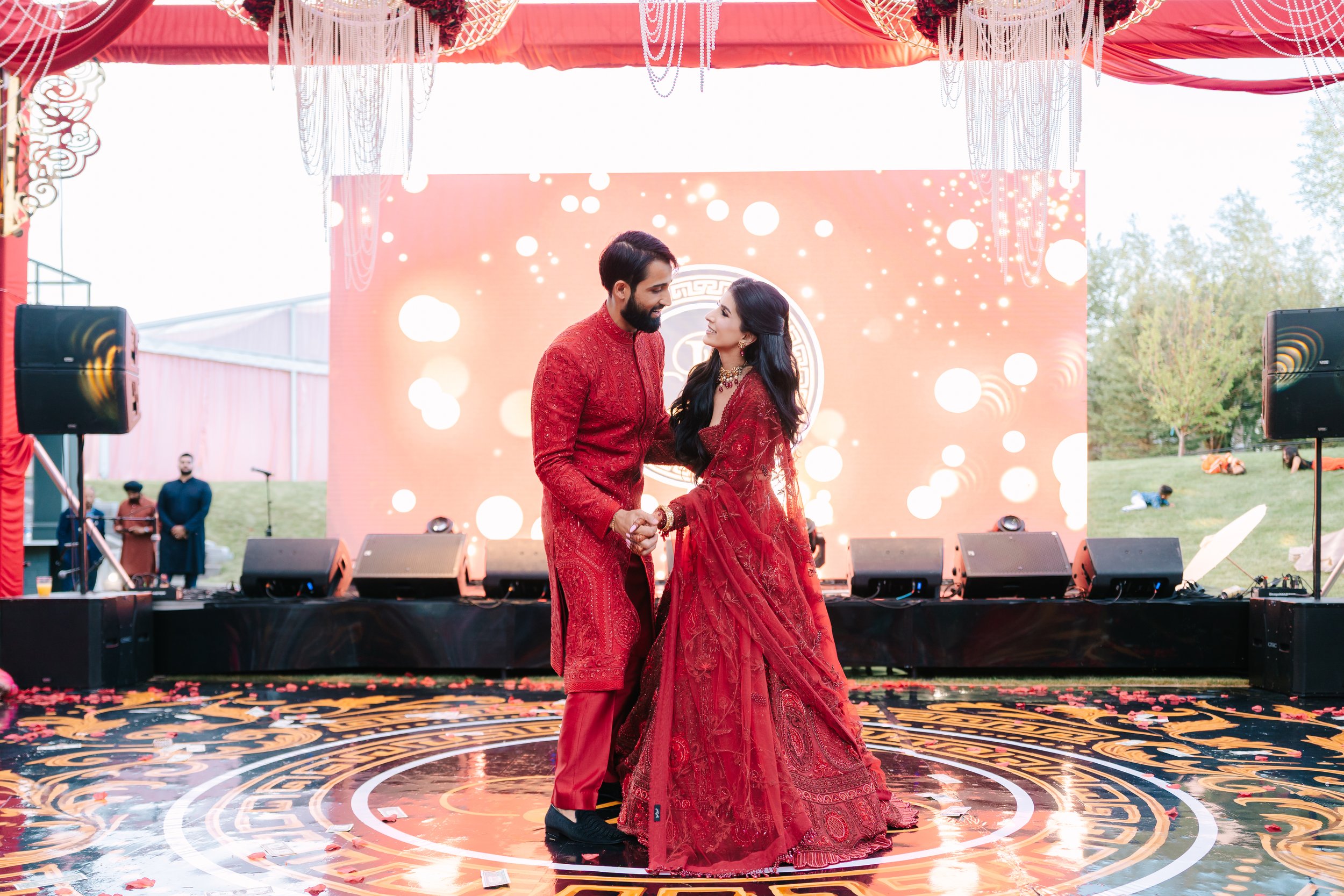 Jessica Gill and Raymond Grewal celebrating their intimate wedding at a private residence in Sherwood Park, Alberta.
