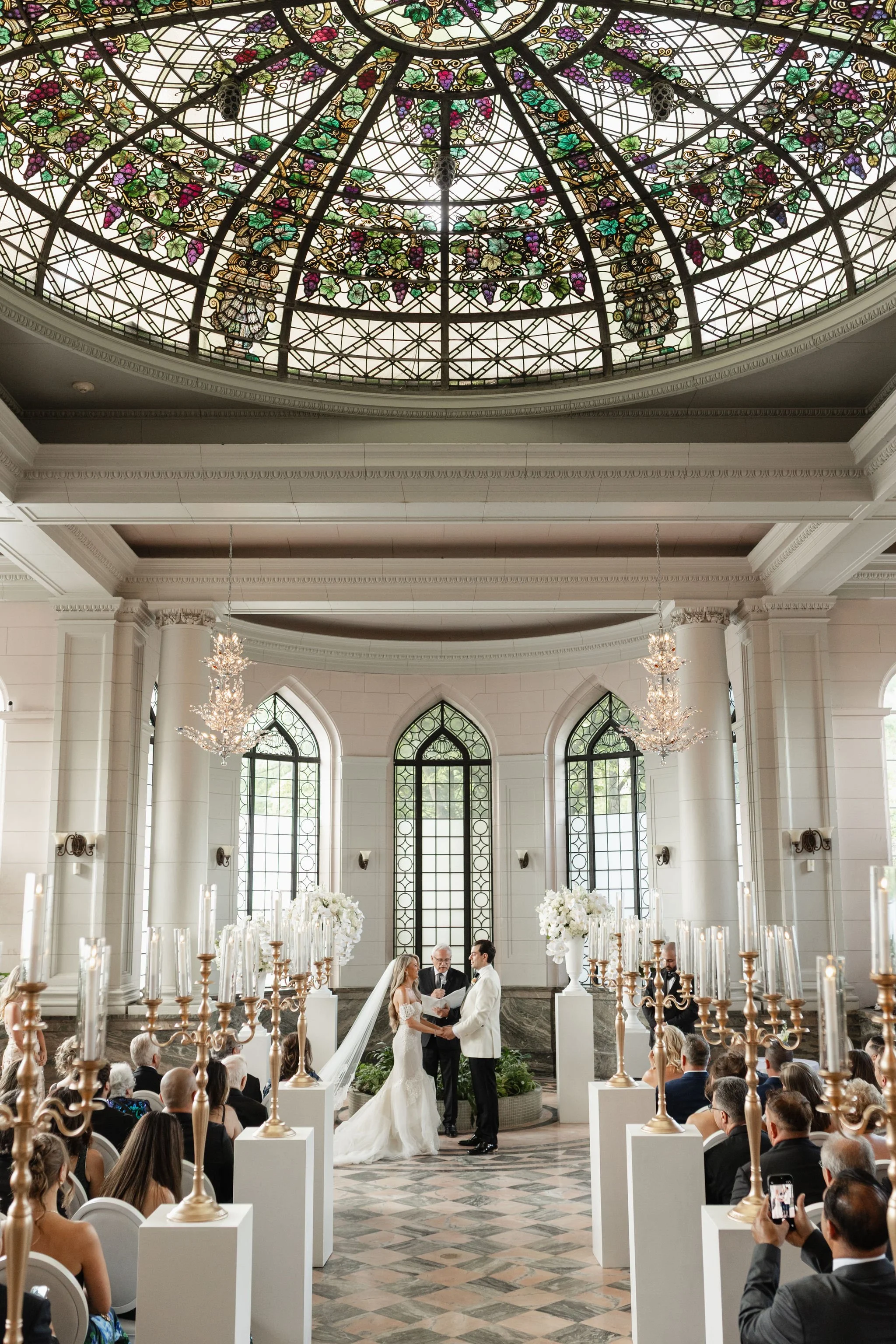 Casa loma wedding - vows in the atrium - canadian couple say I do