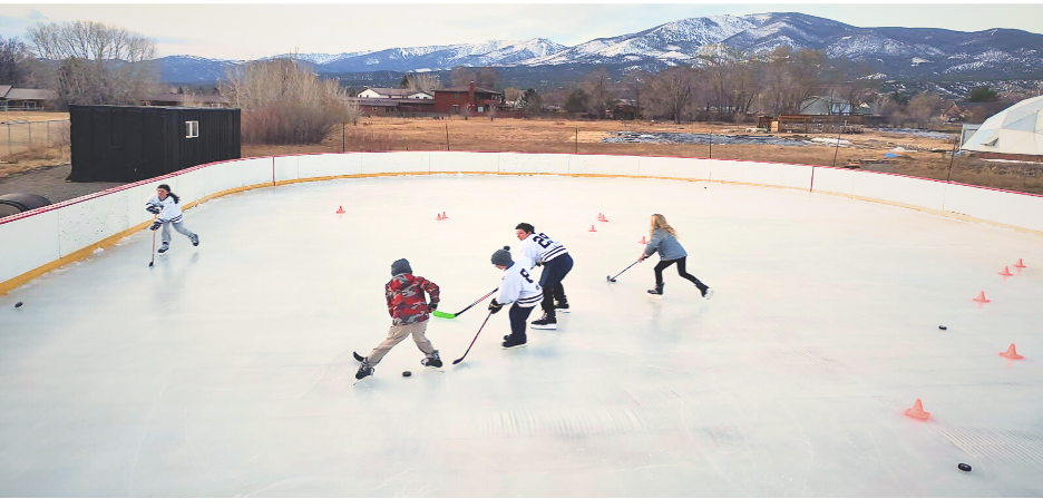 Community members testing out the ice rink. IRCC expects to open the rink to the public next winter