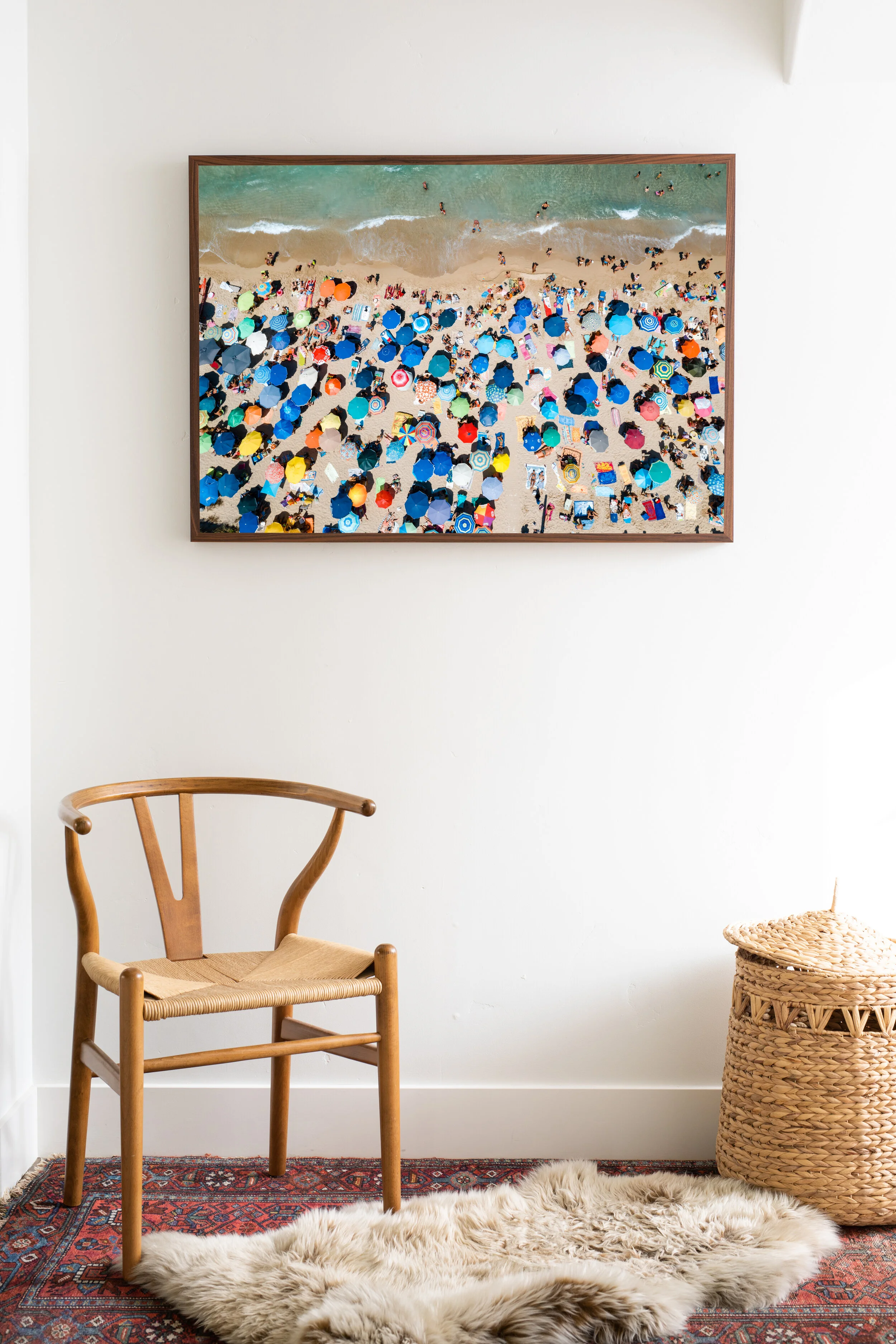 aerial drone image of hundreds of colorful parasols line the beach on the east coast of italy framed hanging on wall