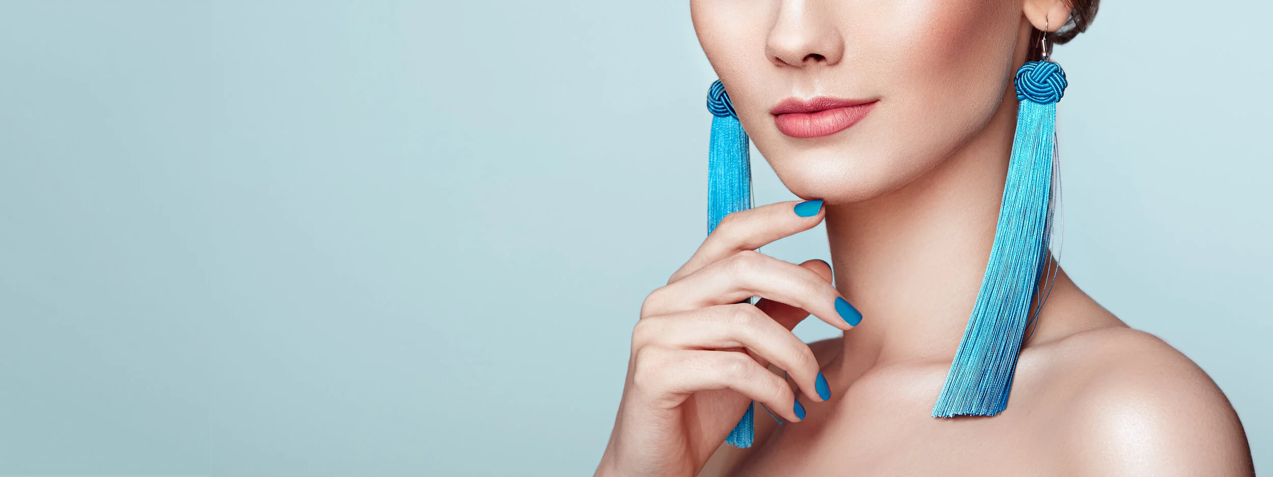 beautiful-woman-with-large-earrings-tassels-JC6J45X.jpg