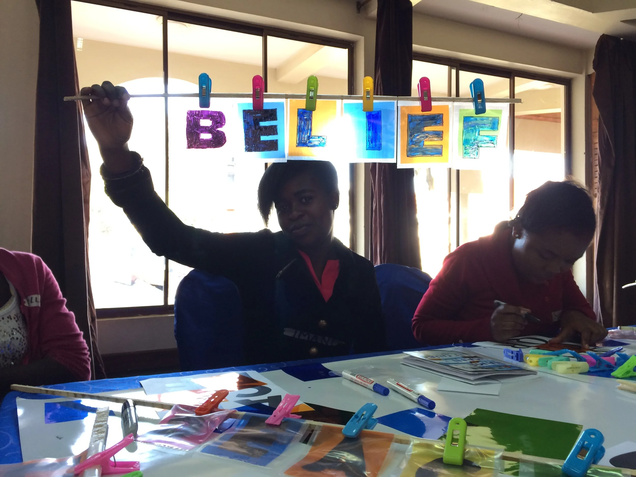 What single word gives you power?  Illuminated Words workshop in Nairobi, Kenya, at a summit for the International Day of the Girl Child, 2016.    