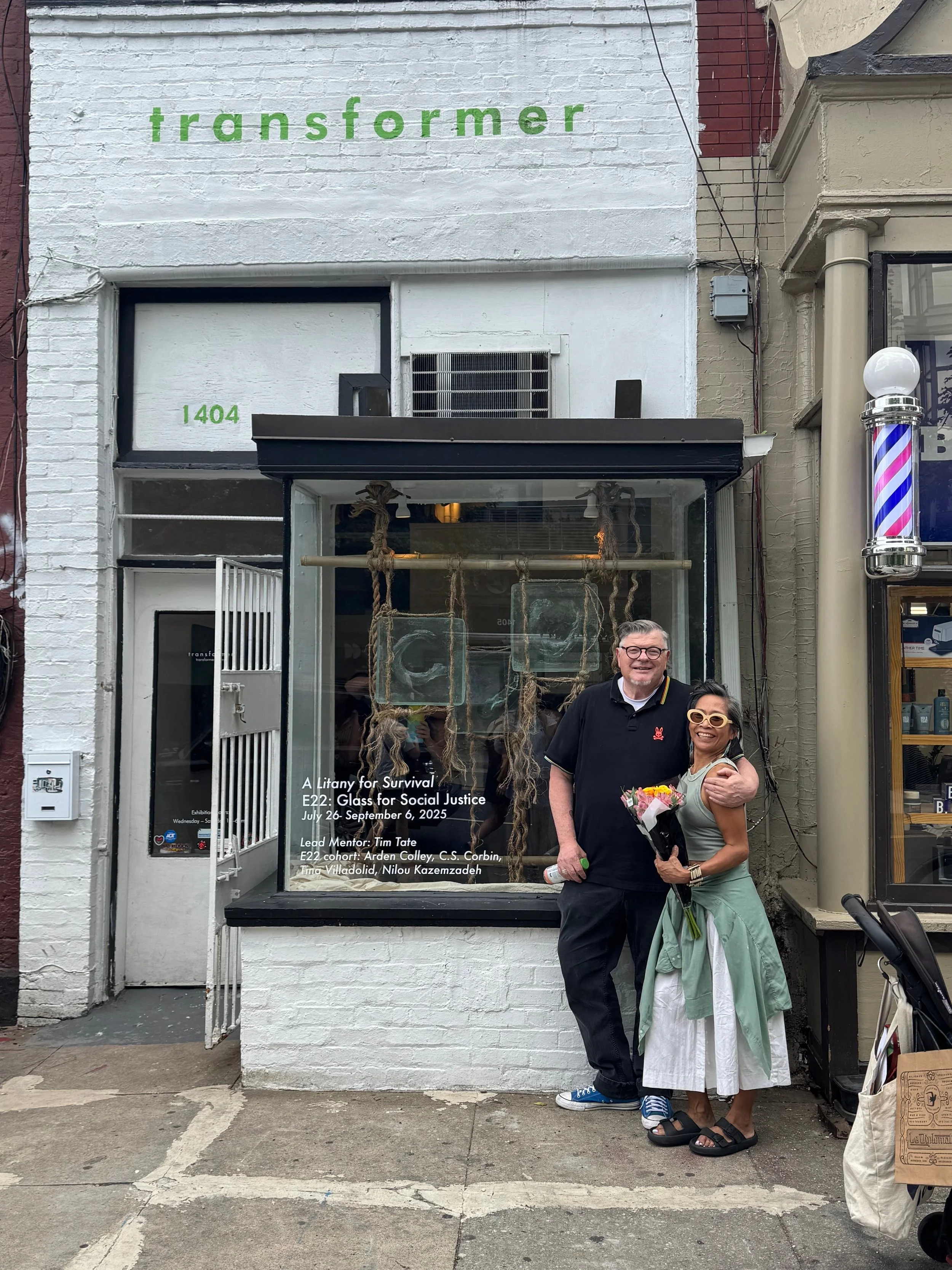  Me and Tim Tate, our cohort’s mentor, at the artist’s talk for A Litany for Survival. We learned how to cast in glass from Tim at the Washington Glass School, Mt. Rainier, MD.  The barber shop next door and my grandson’s baby stroller in the foregro