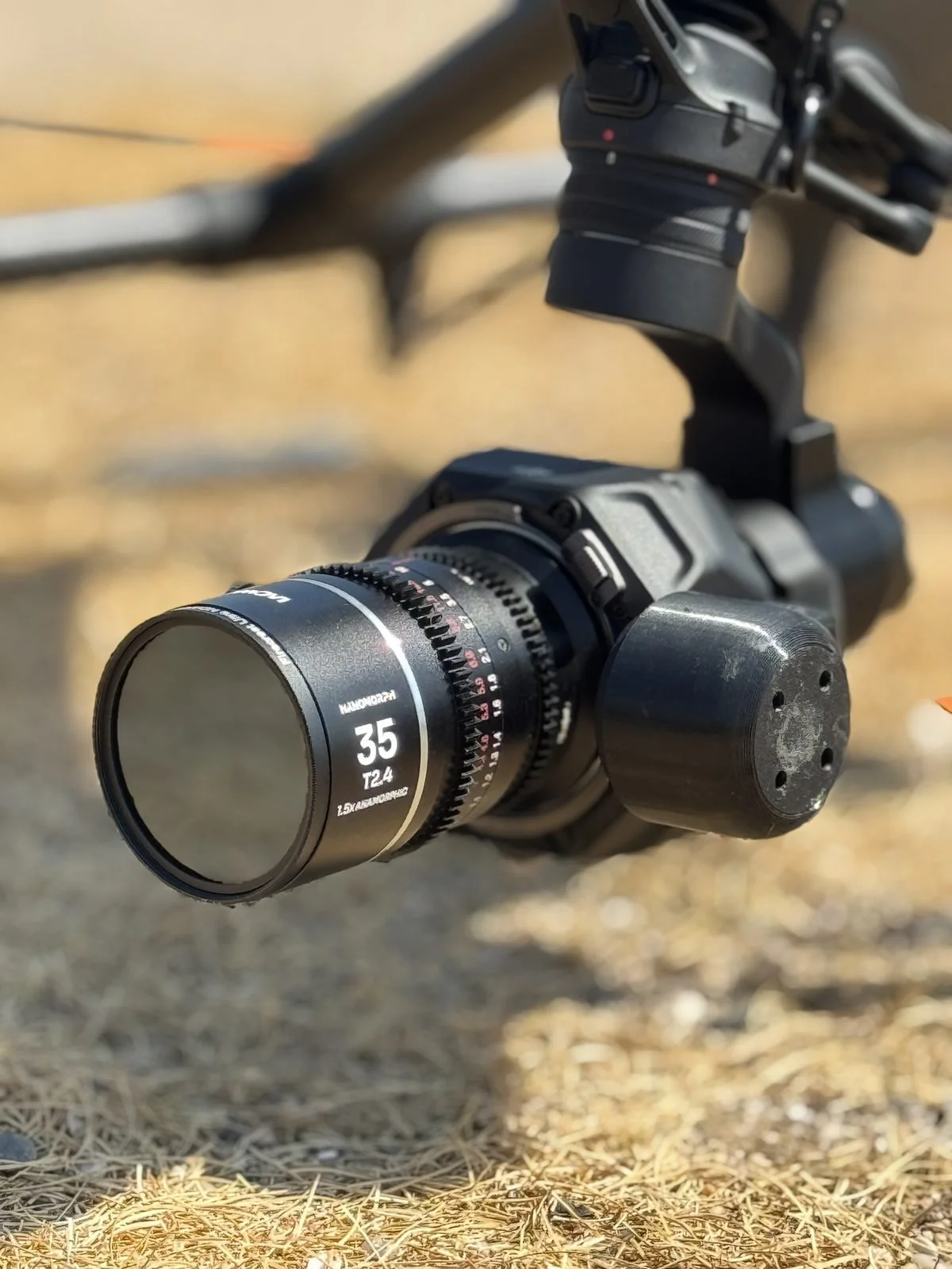 Close-up of the Zenmuse X9-8K Air full-frame camera with a DJI DL 35mm lens