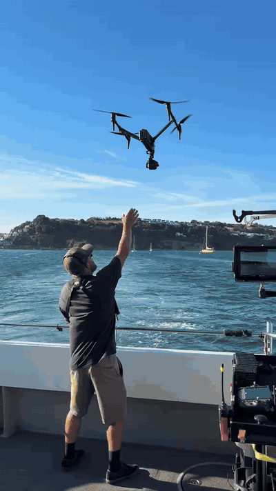 Hand-catching the DJI Inspire 3 on a boat after filming at sea