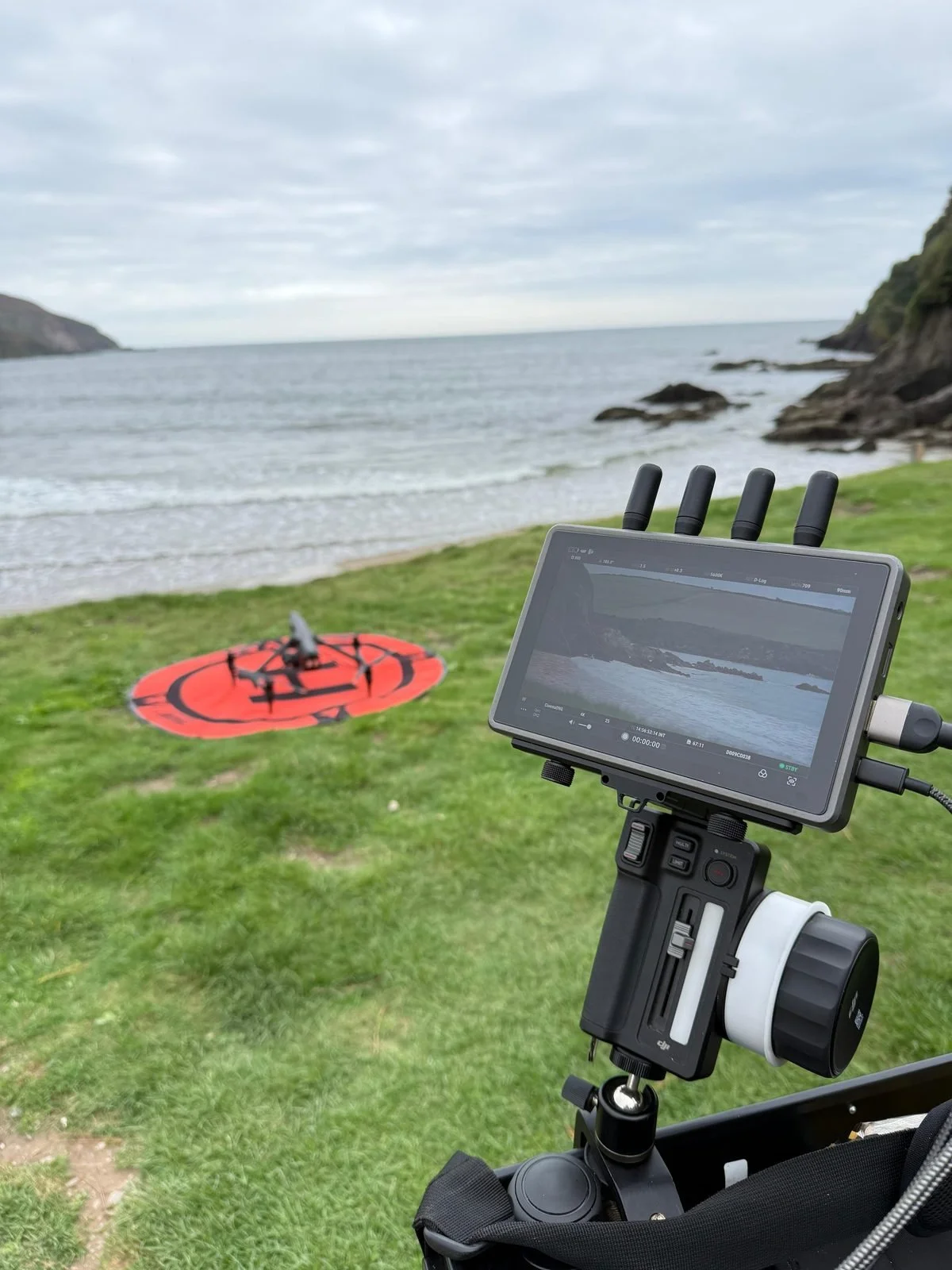 Inspire 3 landing pad, RC Plus and wireless focus control set up on a clifftop location