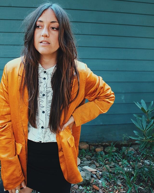 probably my favorite outfit from this shoot. black asymmetrical skirt, pattern button up, and a silk orange blazer.