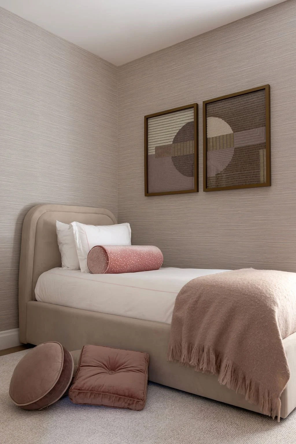 Blush pink guest bedroom with twin bed