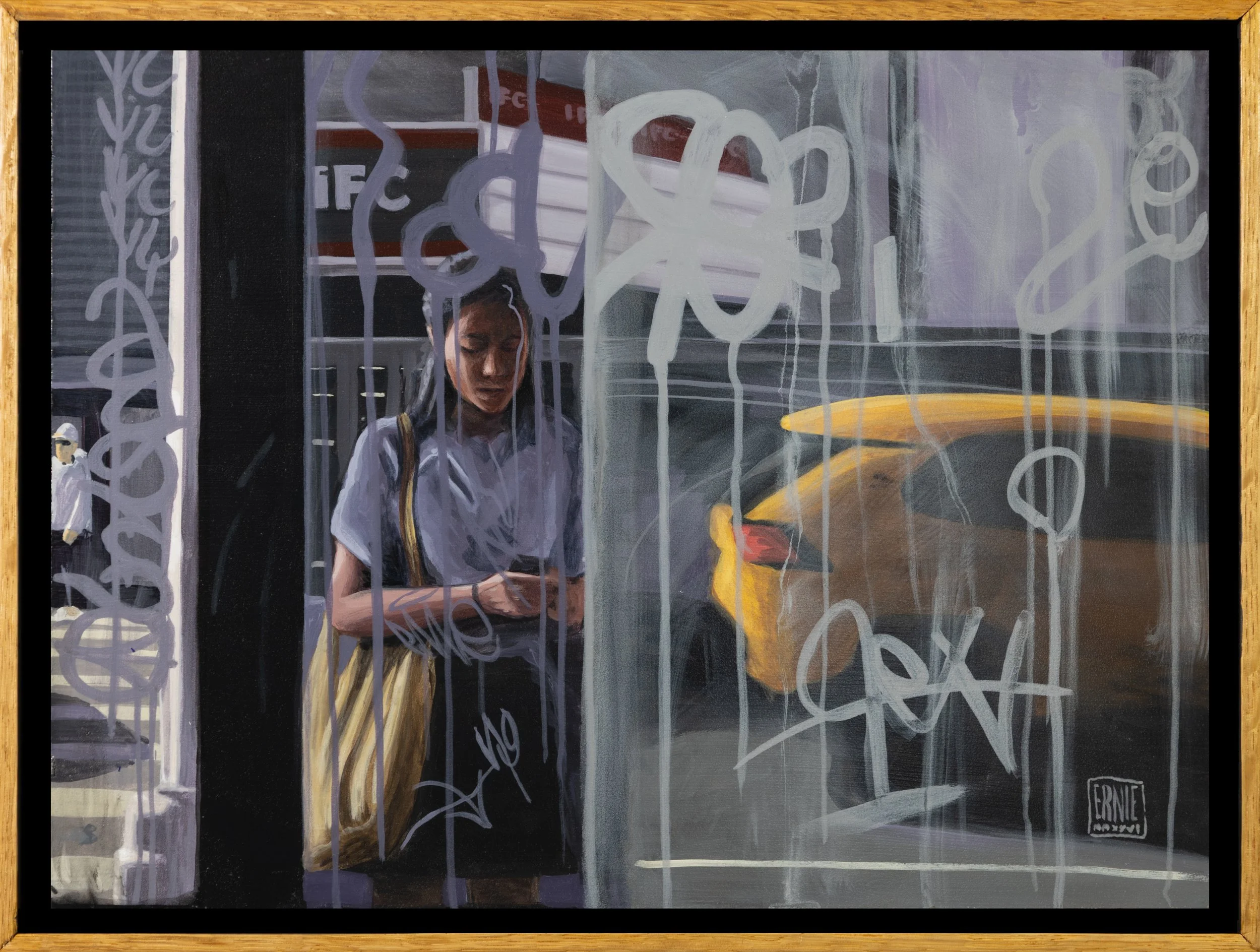 A woman standing behind a window with graffiti, looking down at her phone. A bright yellow car is visible in the background outside the window.