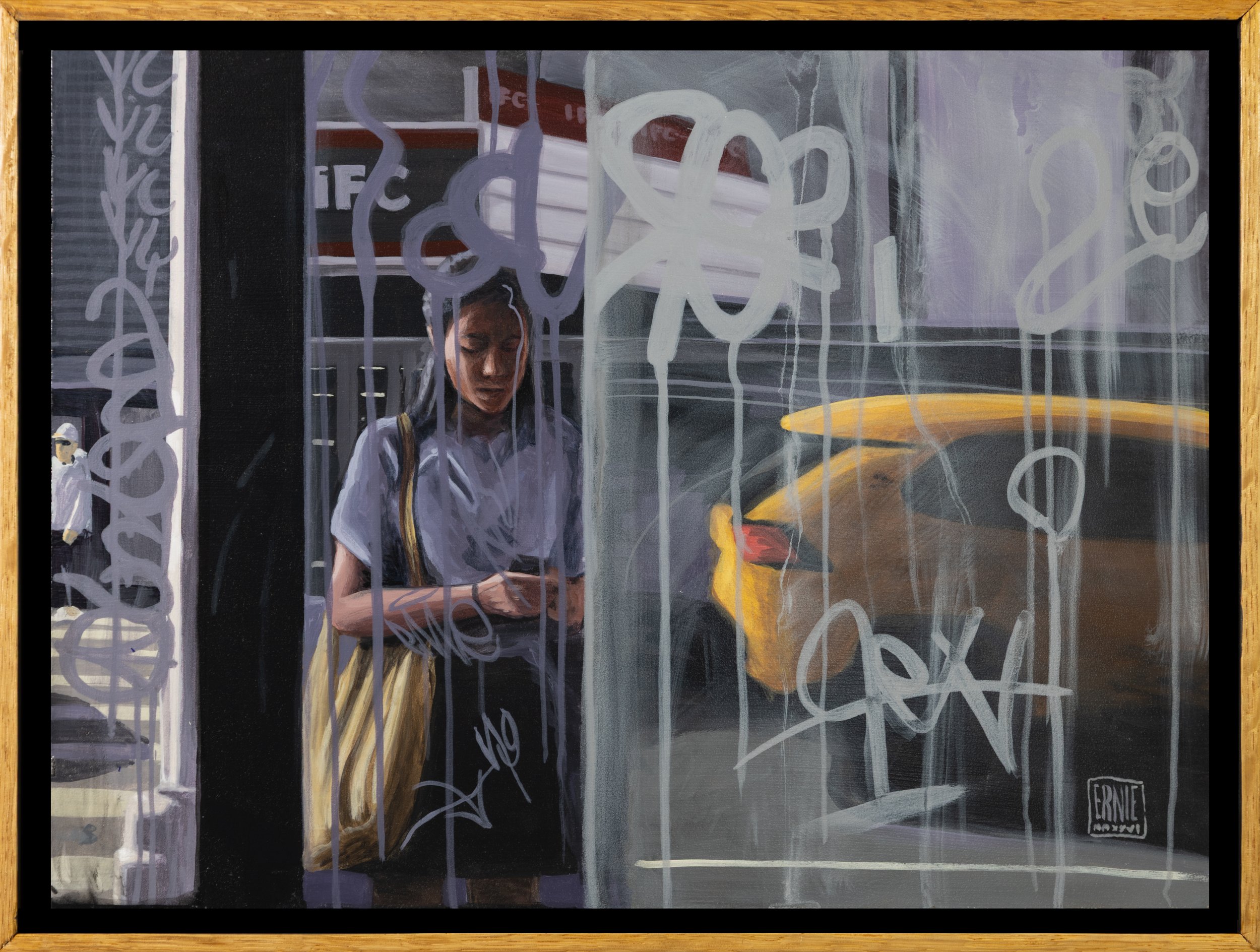 A woman standing behind a window with graffiti, looking down at her phone. A bright yellow car is visible in the background outside the window.