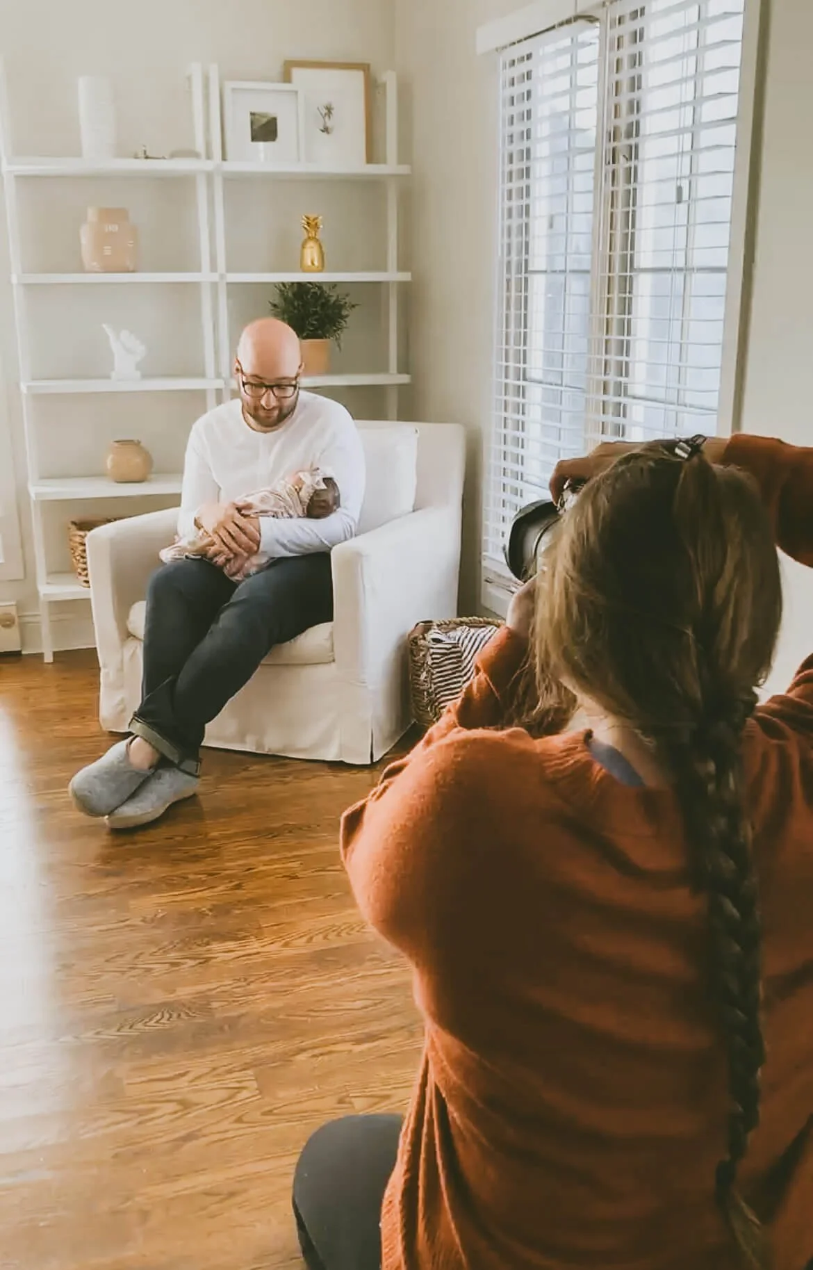 Taylor photographing newborn session