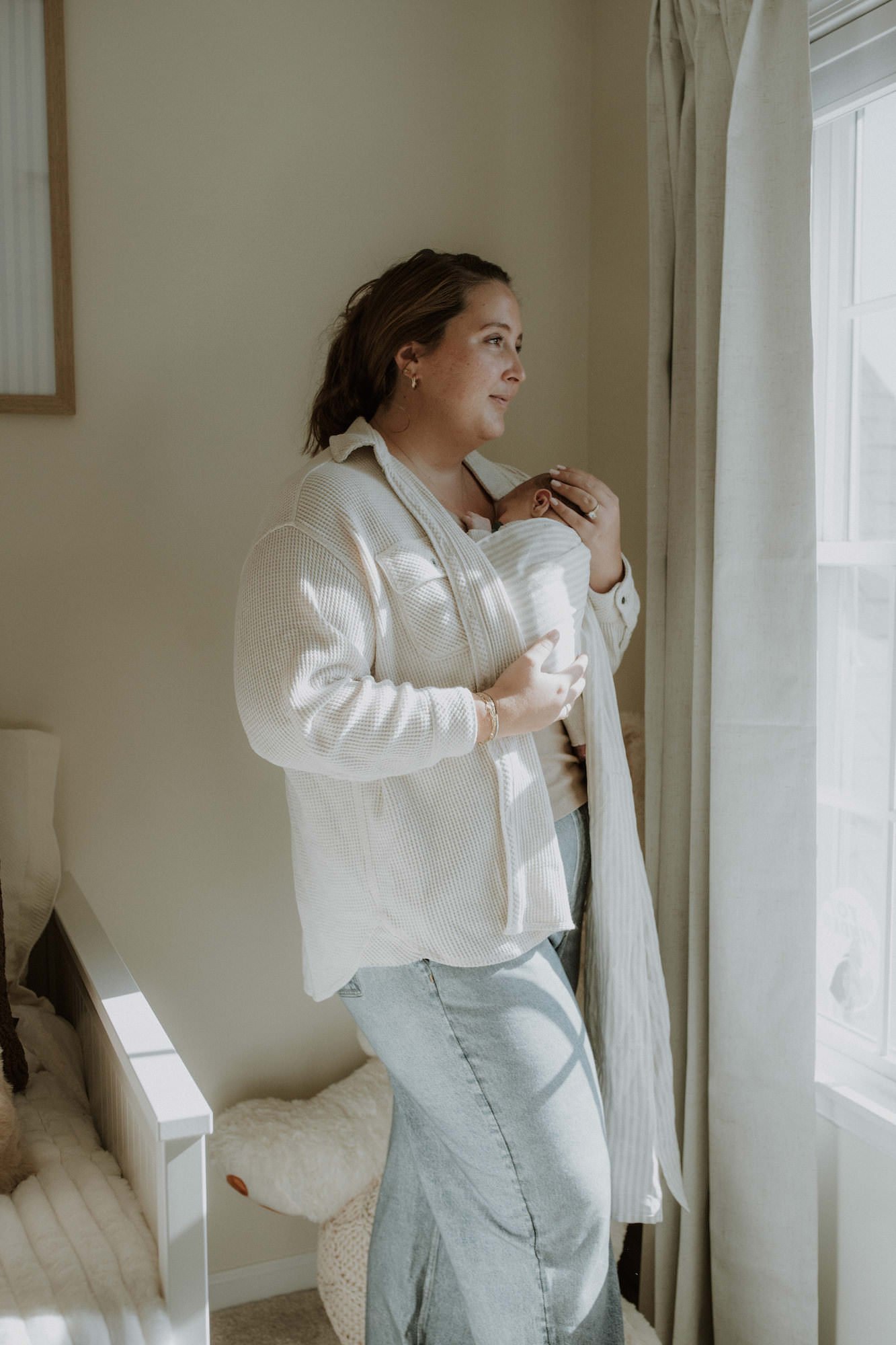 taylor robinson holding her son