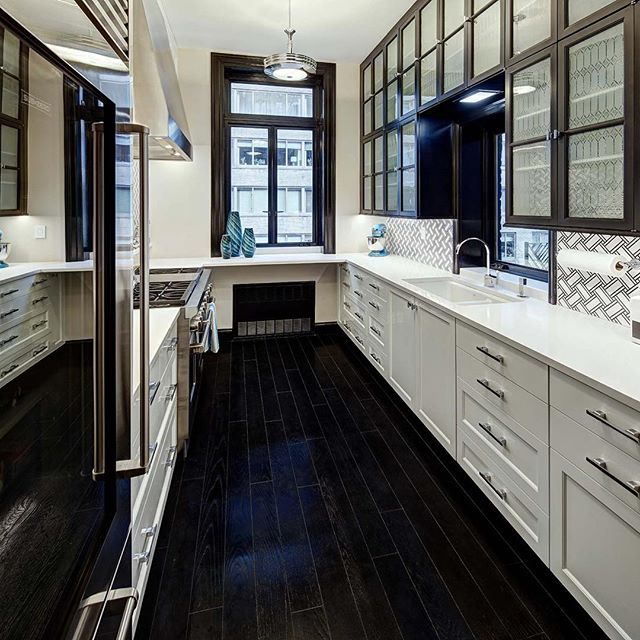 Brownstone renovation NYC. Reuse,refinish &amp; refurbish. NYC renovation with new windows new floors new base cabinets,countertops and backsplash beautiful glass in old reuse wall cabinets from 1920 French train cars. @townhousekitchens @townhouseki