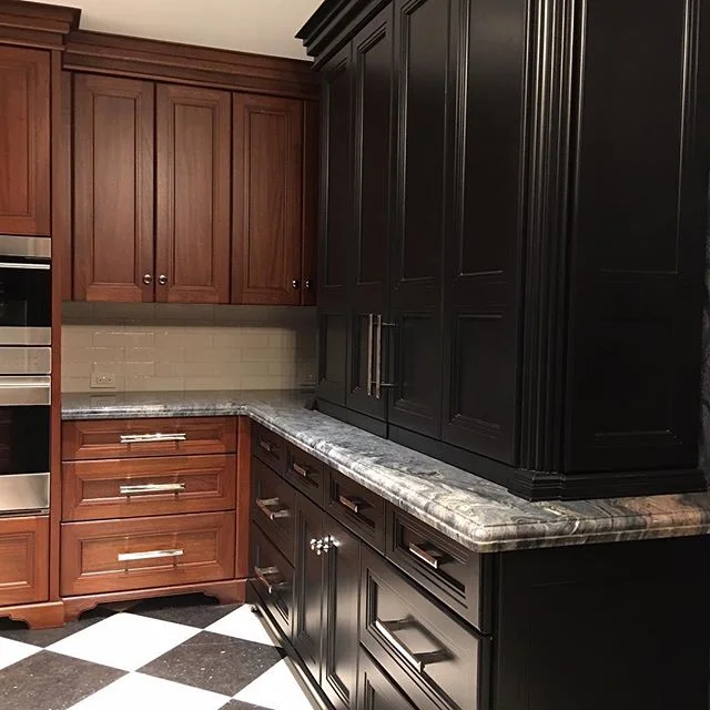 The ultimate appliance garage lives behind these doors - upper east side kitchen @townhousekitchens @townhousekitchensnyc @zicanasurfaces @craftmaidkitchens @nyc_design @kitchens_of_insta @nydc #kitchendesign #customkitchen #blackkitchen #appliancega