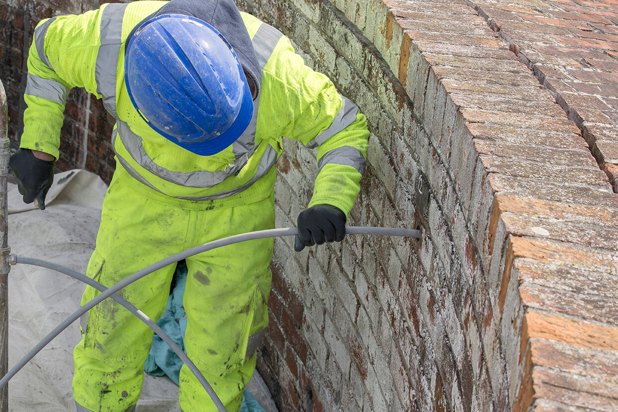Placing lines into pre-drilled brickwork
