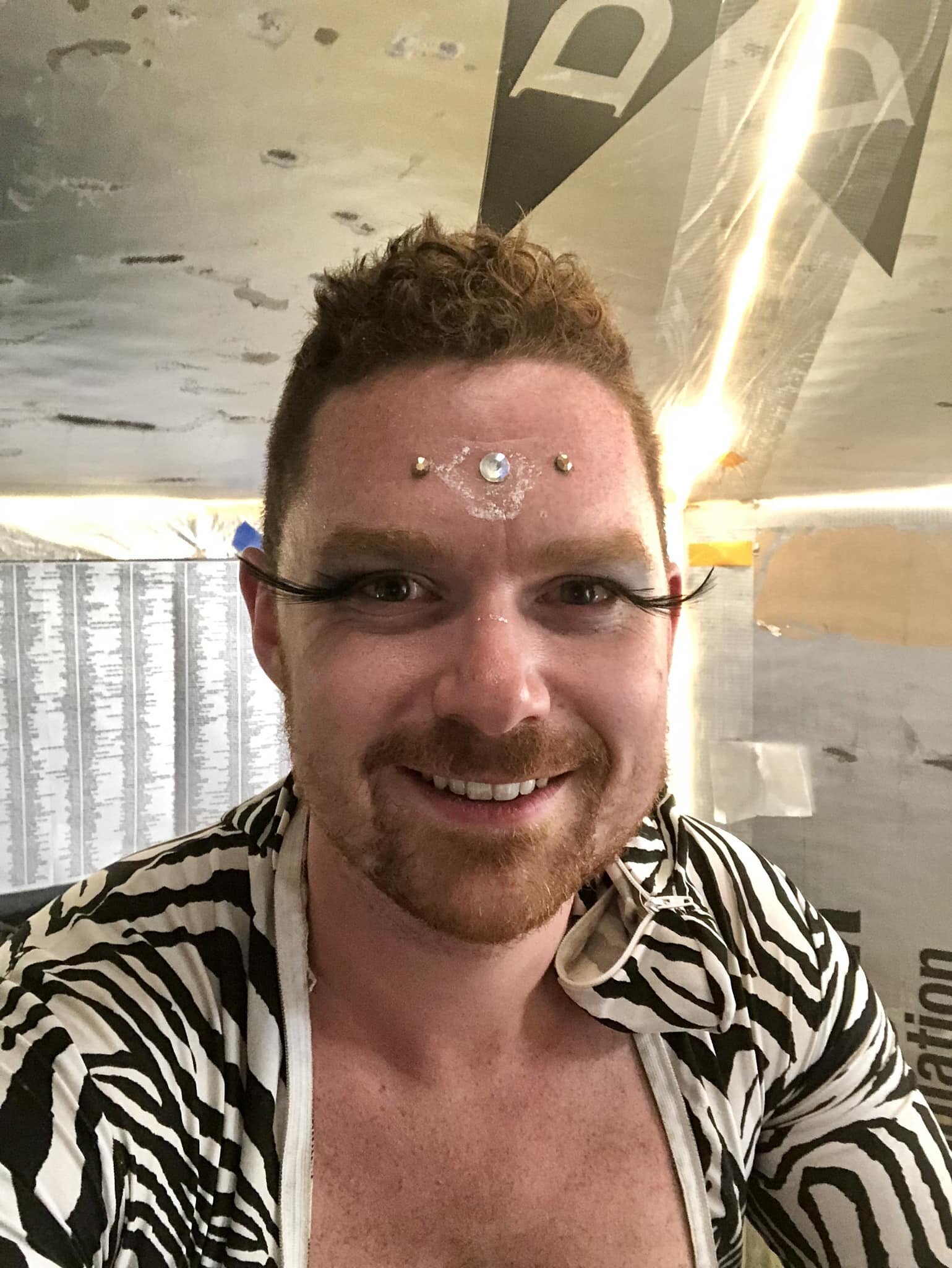 throw back to being a happy burner. burning man is hard. but dont believe the news. weather happens. burners survive.