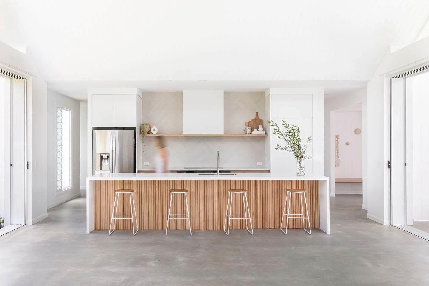 Neutral tones, Vic Ash timber and plenty of natural light fill the spacious kitchen of our Mill Residence.