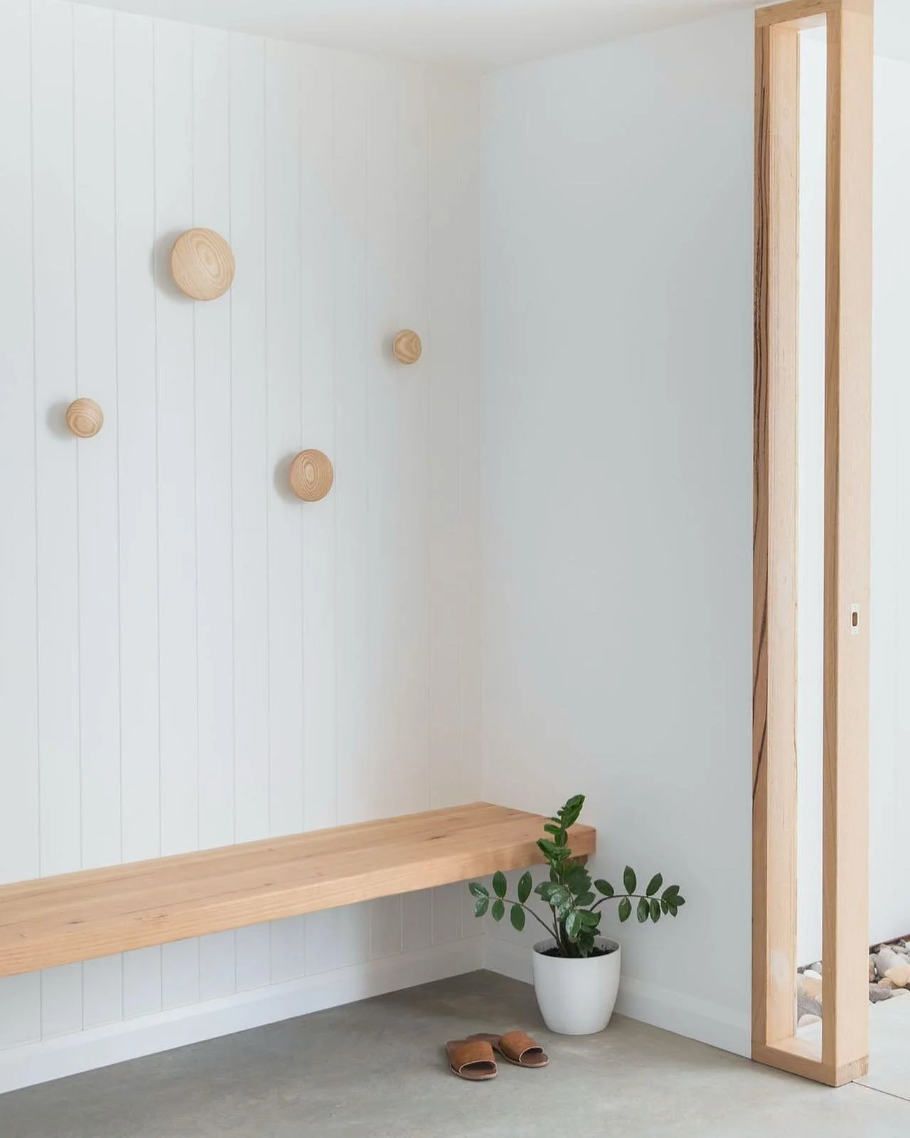 Entry details at our Mill residence feat. our custom made timber fixtures