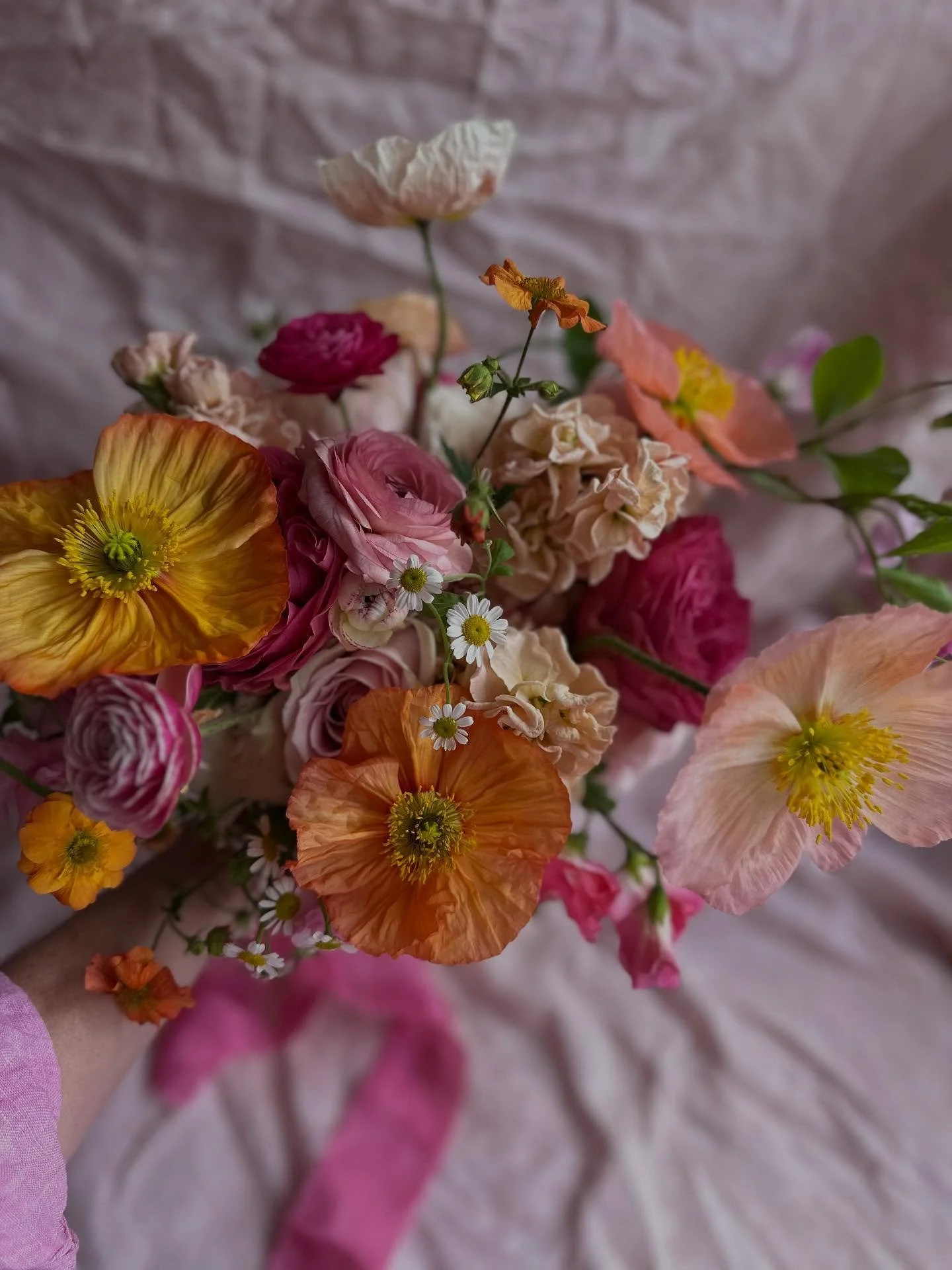 Celebrating Spring with Taryn's vibrant bouquet yesterday. Poppies, roses, ranunculus, sweetpeas, stock, feverfew and geums. 

My favourite moment when designing Taryn's bouquet was picking the sweetpeas and ranunculus with Fleur from our patch, then