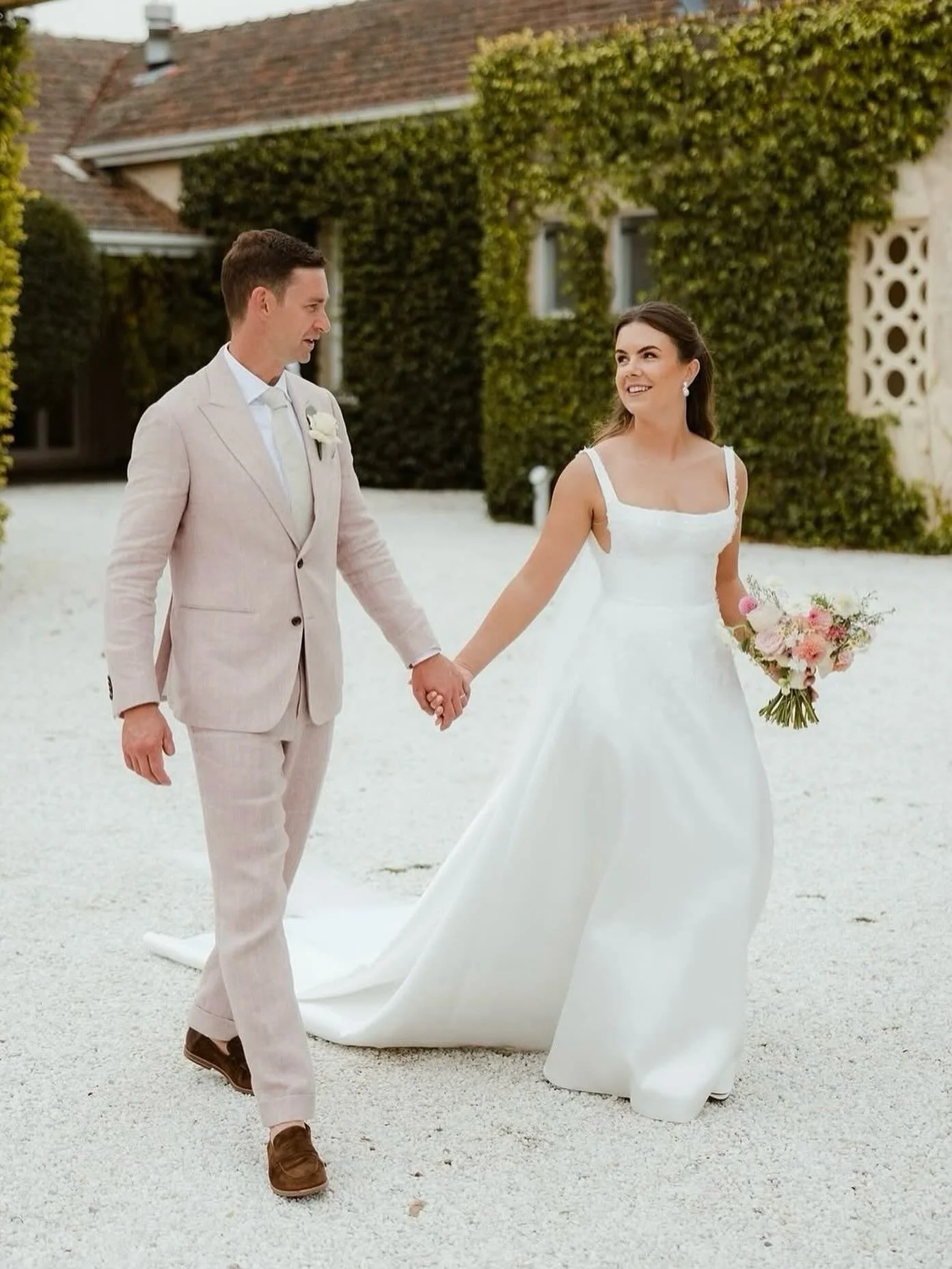 In the beautiful stillness on the eve of a wedding, I'm often found drinking cups of tea and trimming garden roses, hoping tomorrow is the most magical day for the couple. I like to make sure all the stems are tucked into their buckets ready for tran
