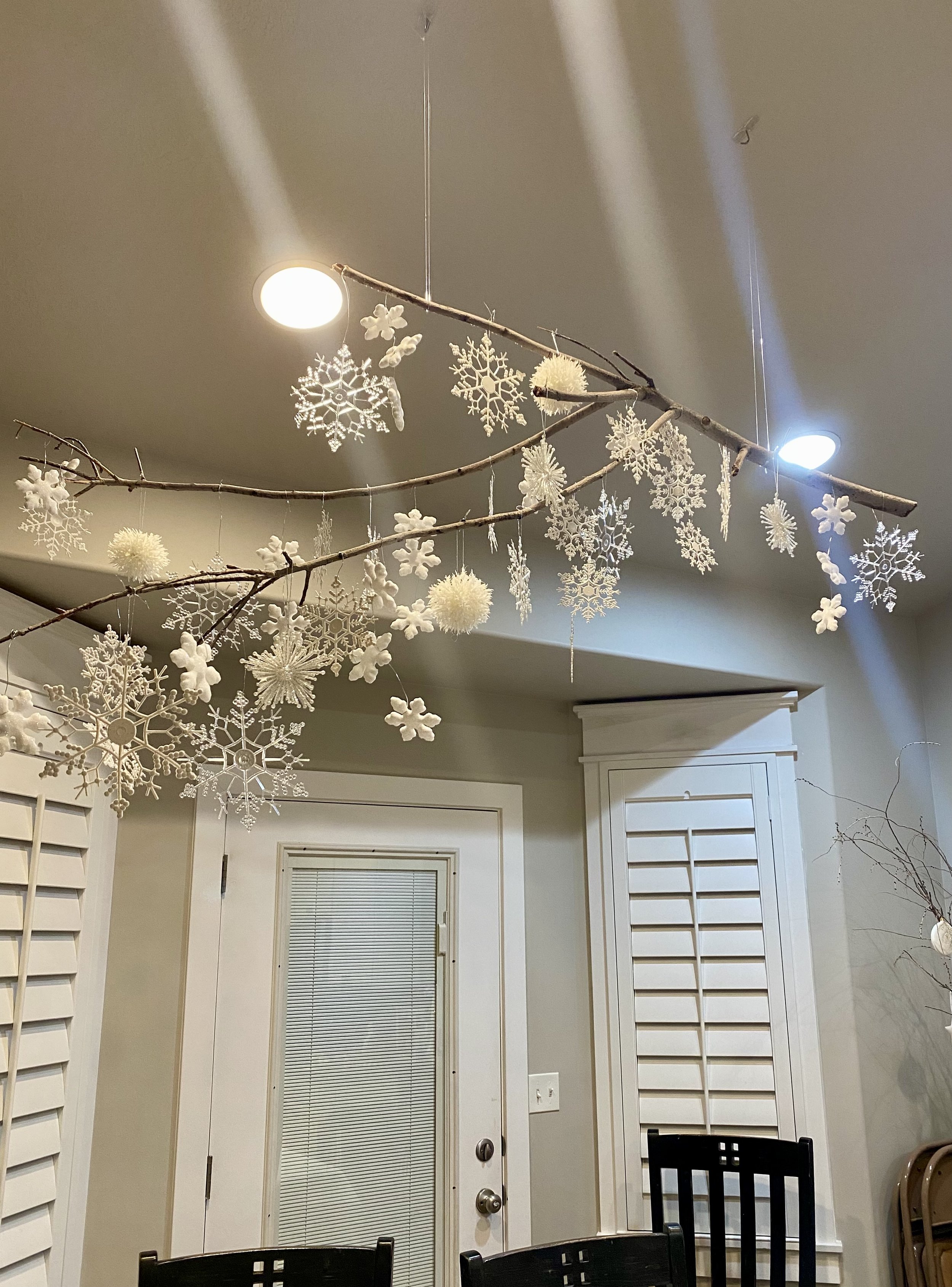 Snowy Forest Christmas Table hanging snowflakes.jpeg