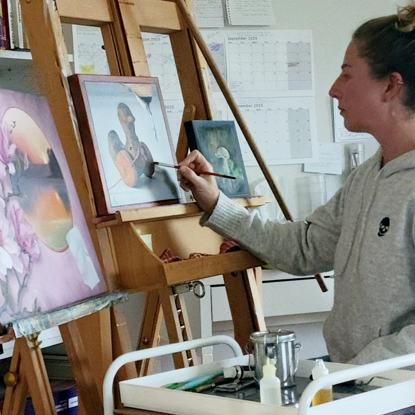 🎨 📸 A peek into the studio today &mdash; three very different paintings, each taking shape in their own damn time... cos when the creative muse decides to drag her sorry arse, you may decide drinking from the solvent bottle is more appealing than s