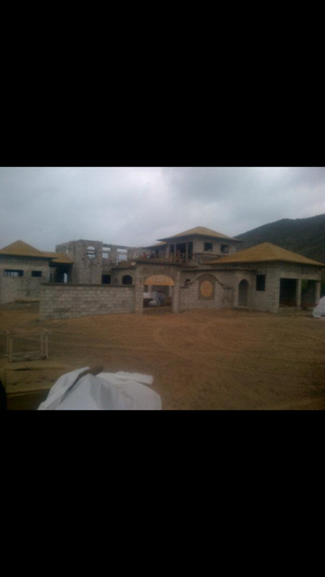 Spanish style home with exterior natural stone masonry